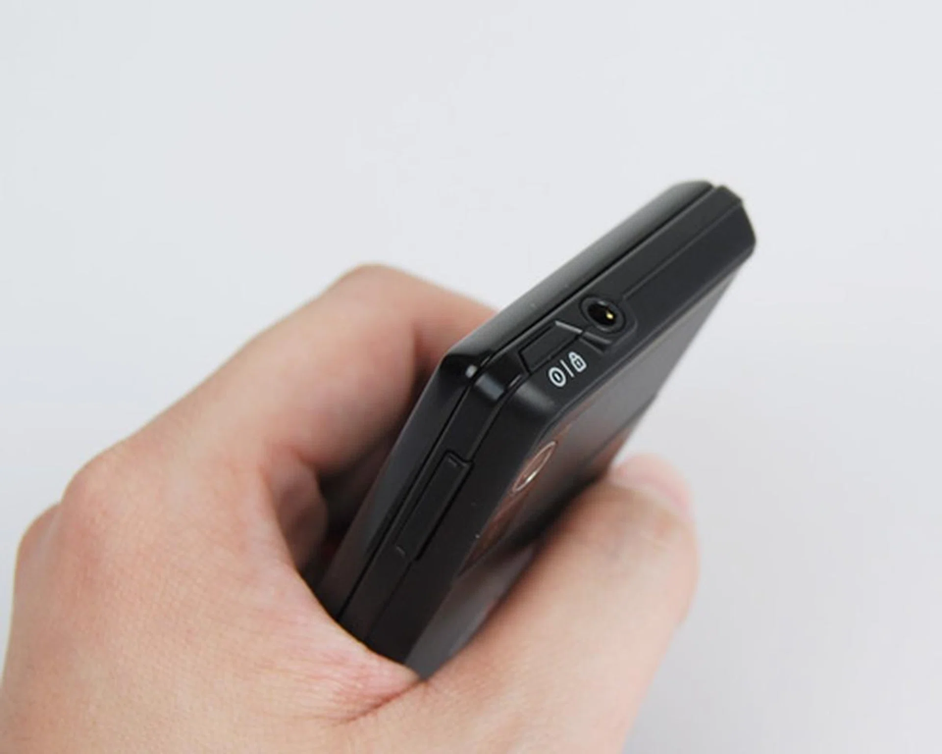 A 3.5mm audio port, besides the fully flushed Power button.