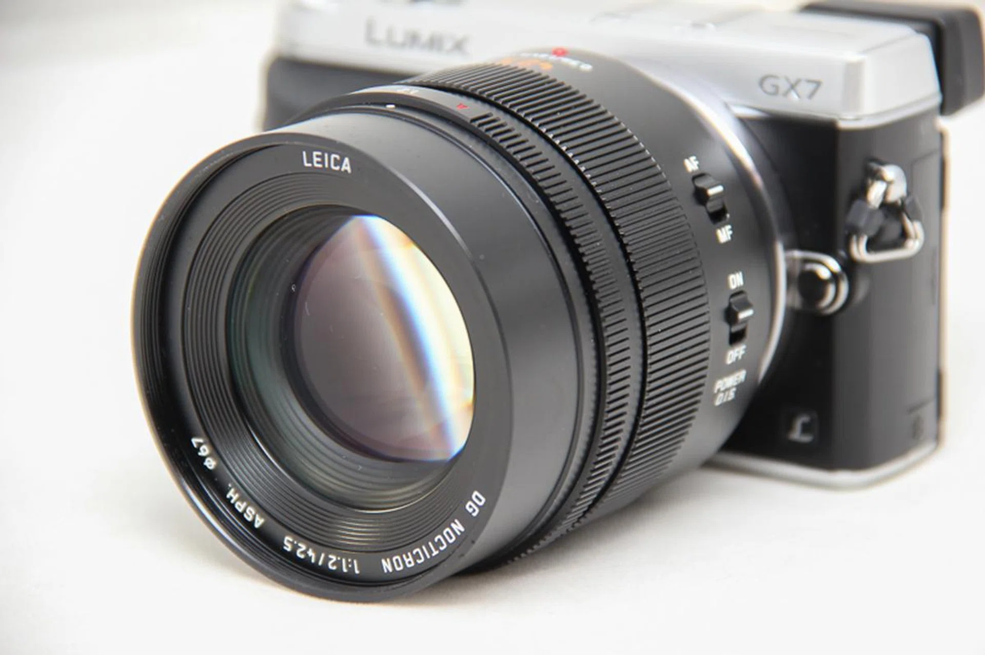 The 42.5mm is hefty, just nice on a GX7 but not on a smaller camera.