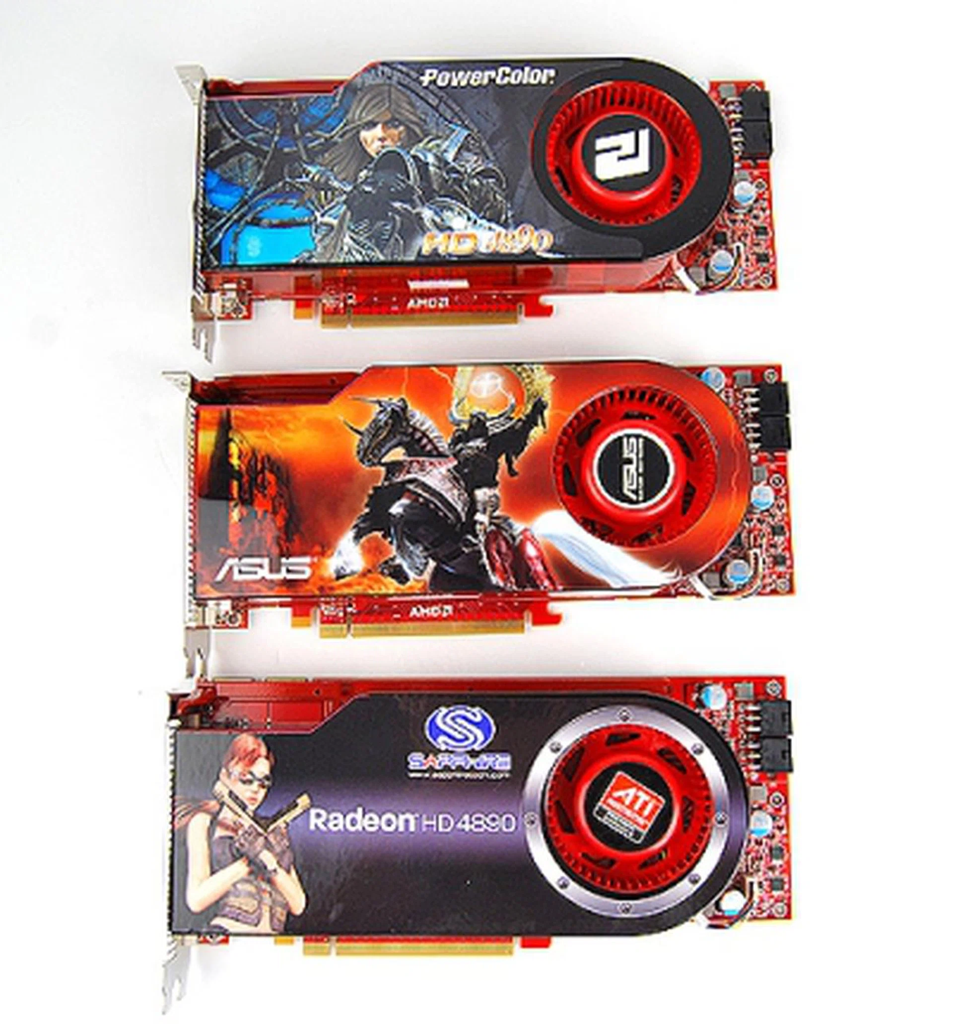 Our three Radeon HD 4890 cards stacked neatly. Without their stickers on, even "Photo Hunt" experts will have difficulty trying to spot the differences between them. 