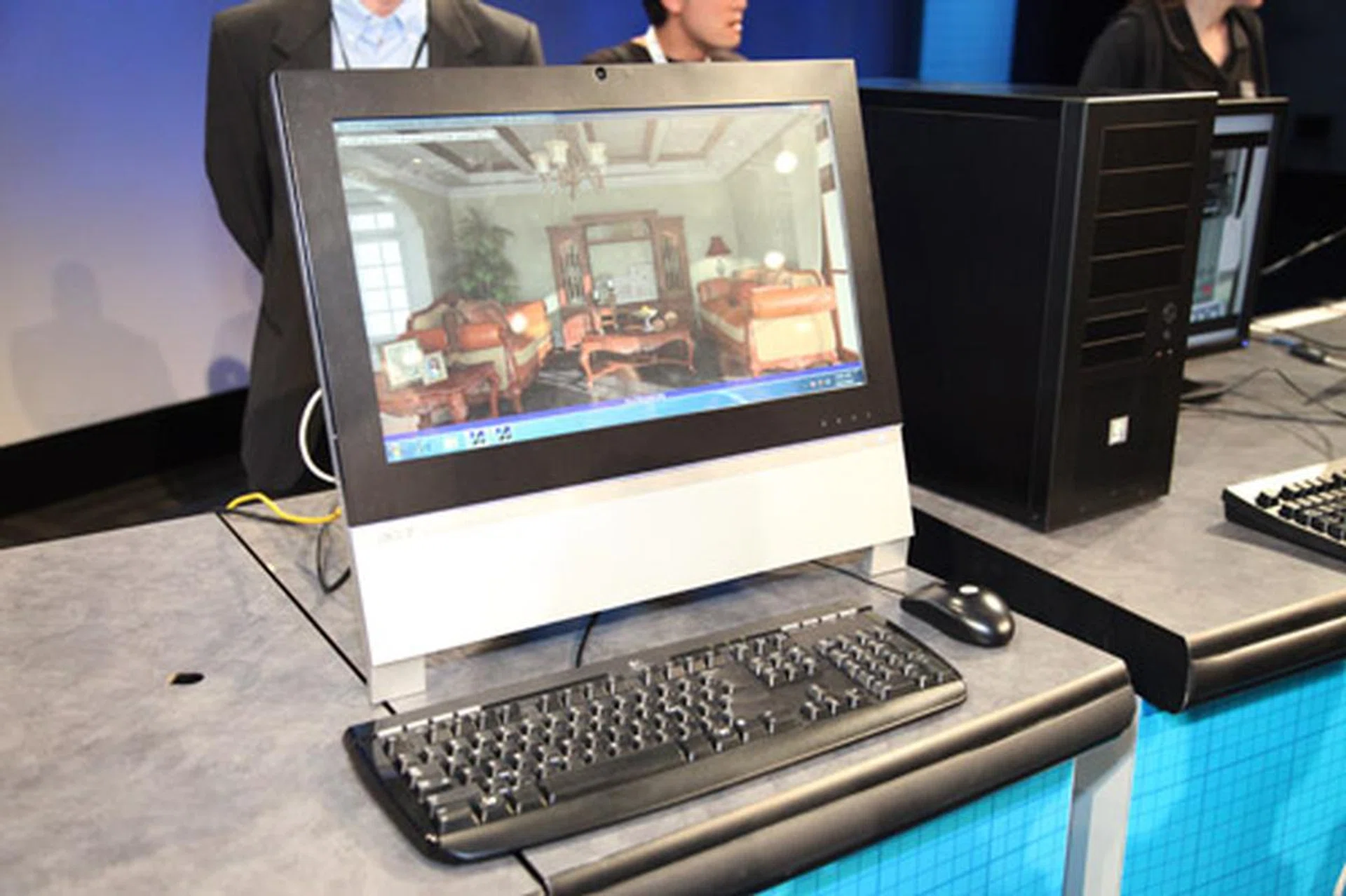 An Acer all-in-one desktop PC with a low power Sandy Bridge processor demonstrating complex 3D renders taking advantage of Intel's AVX instruction set.