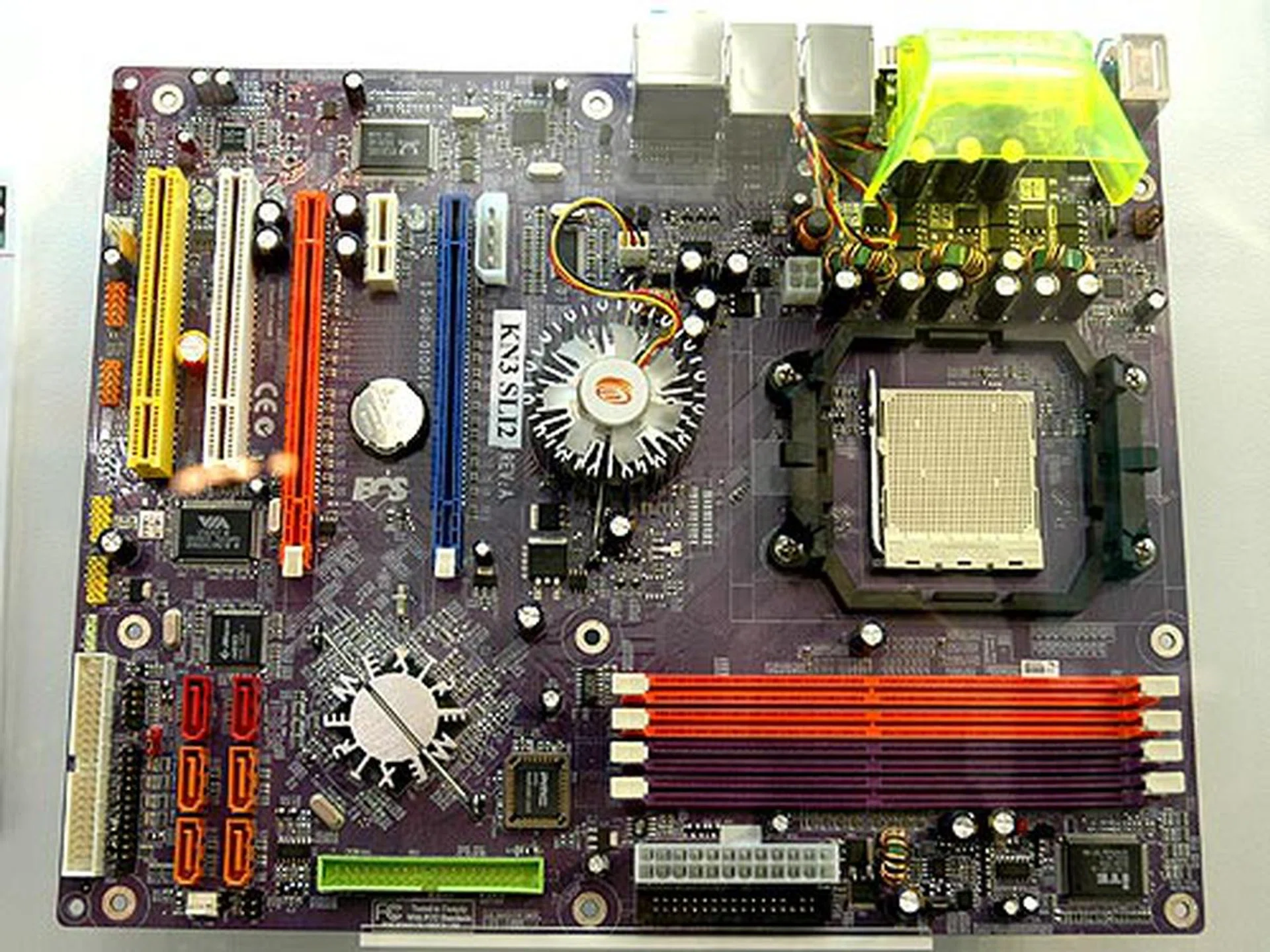 The new KN3 SLI2 is based on the NVIDIA C51XE chipset that supports dual PCIe x16 slots for SLI setup. Made for the new Socket M2 processors from AMD, the board comes with two PCIe x16 slots, one PCIe x1 slot, two PCI slots, eight SATA 3G RAID ports, one Gigabit LAN port, one Fast Ethernet LAN port and an eight-channel high definition audio codec.