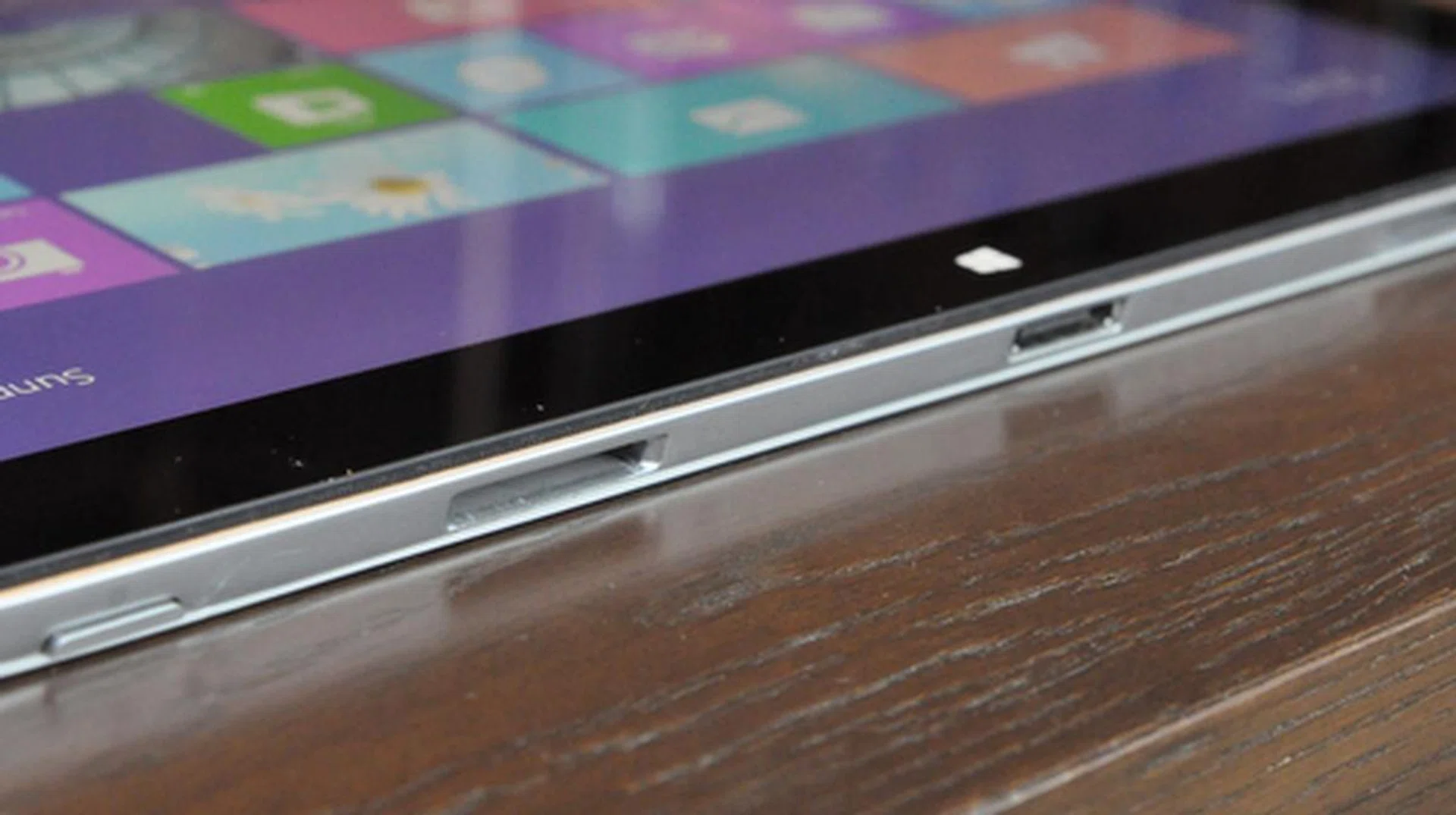 On the bottom left of the tablet, you will find the microSD slot. 