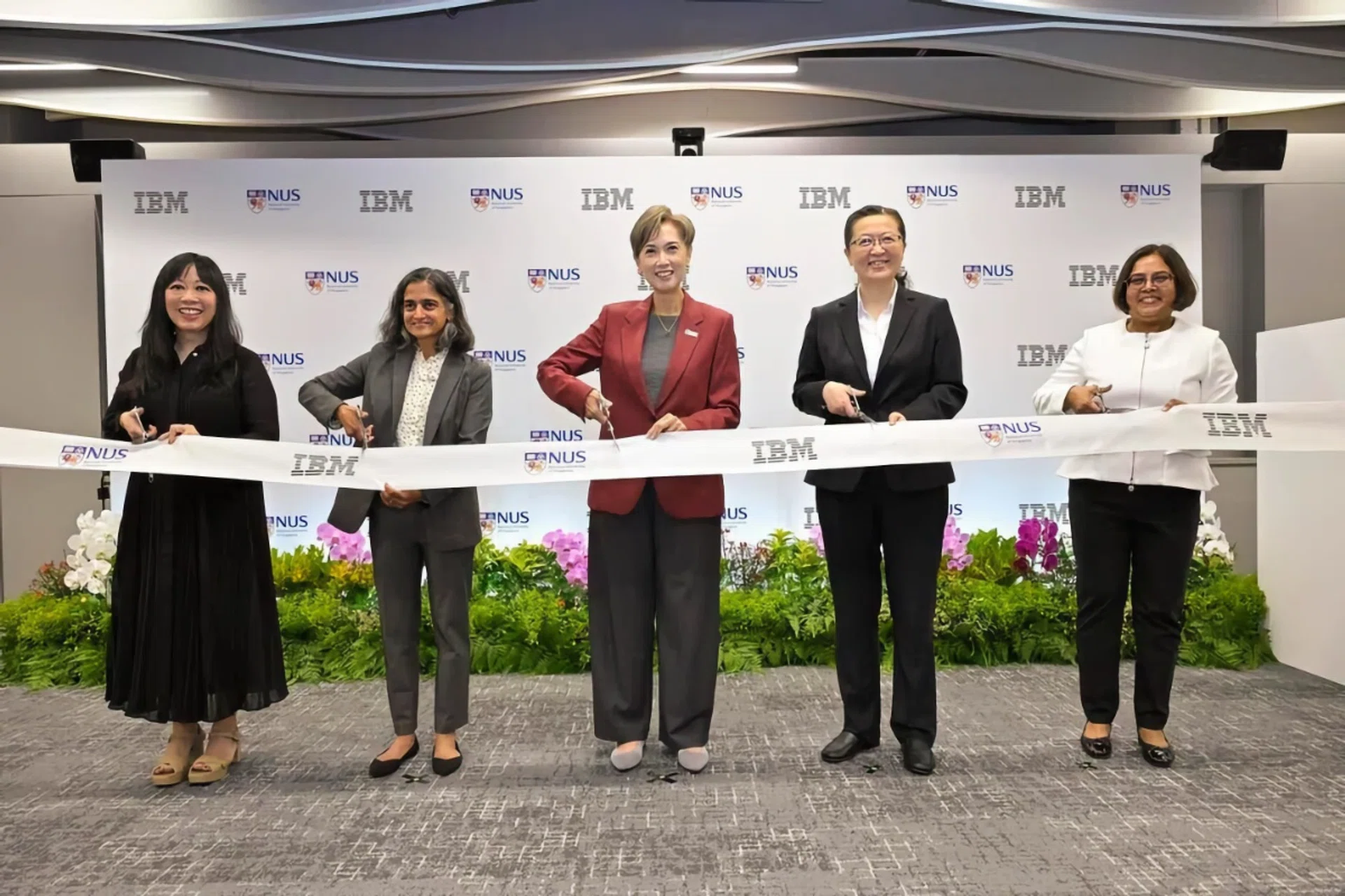 Minister for Digital Development and Information Josephine Teo (centre) at the opening of the IBM-NUS AI research and innovation centre.