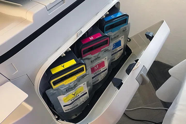 The ink packs can be loaded quickly from the sides of the printer.