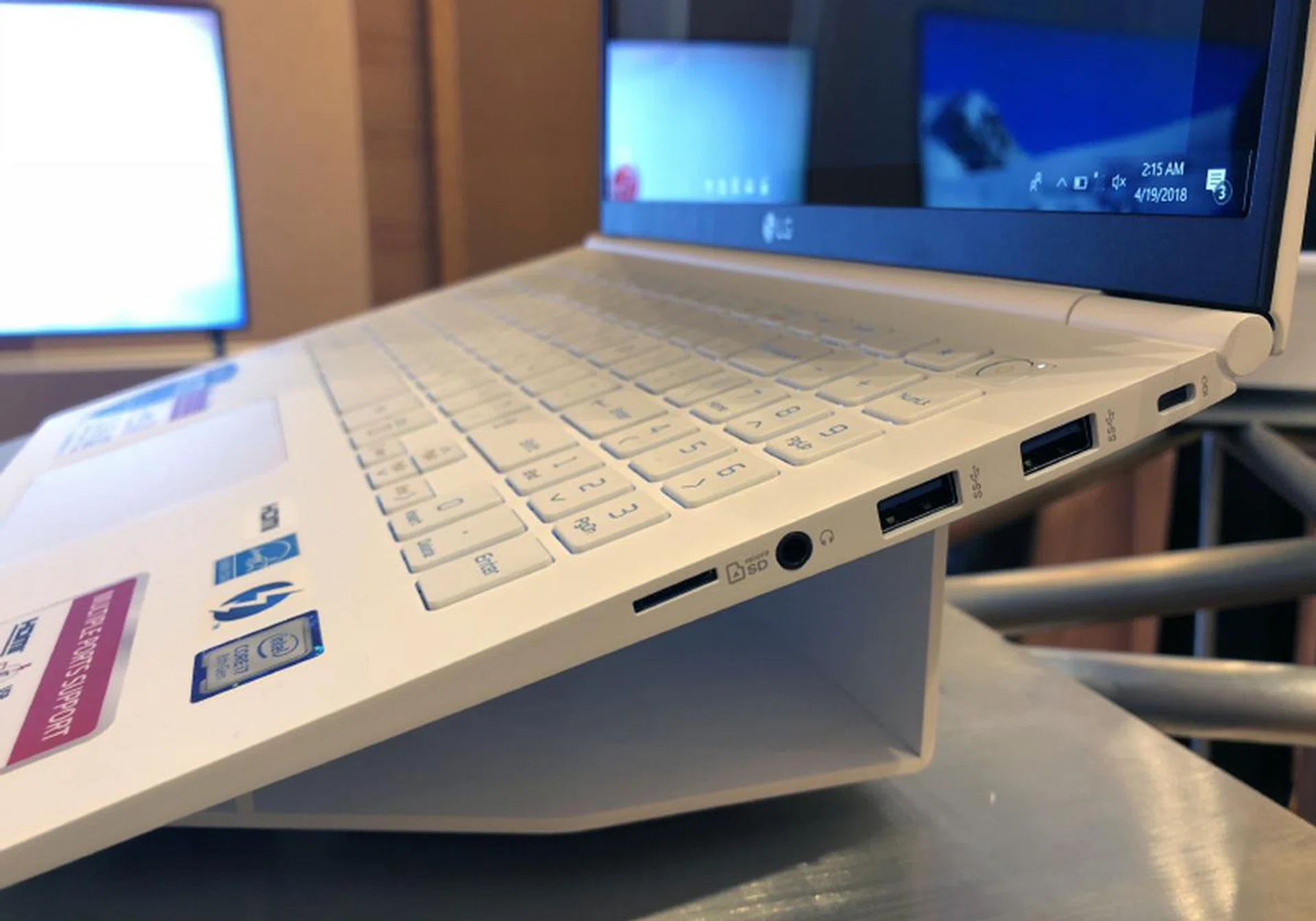 On the right, there's two additional USB 3.0 ports, a headphone jack, micro-SD card reader, and a Kensington lock slot.