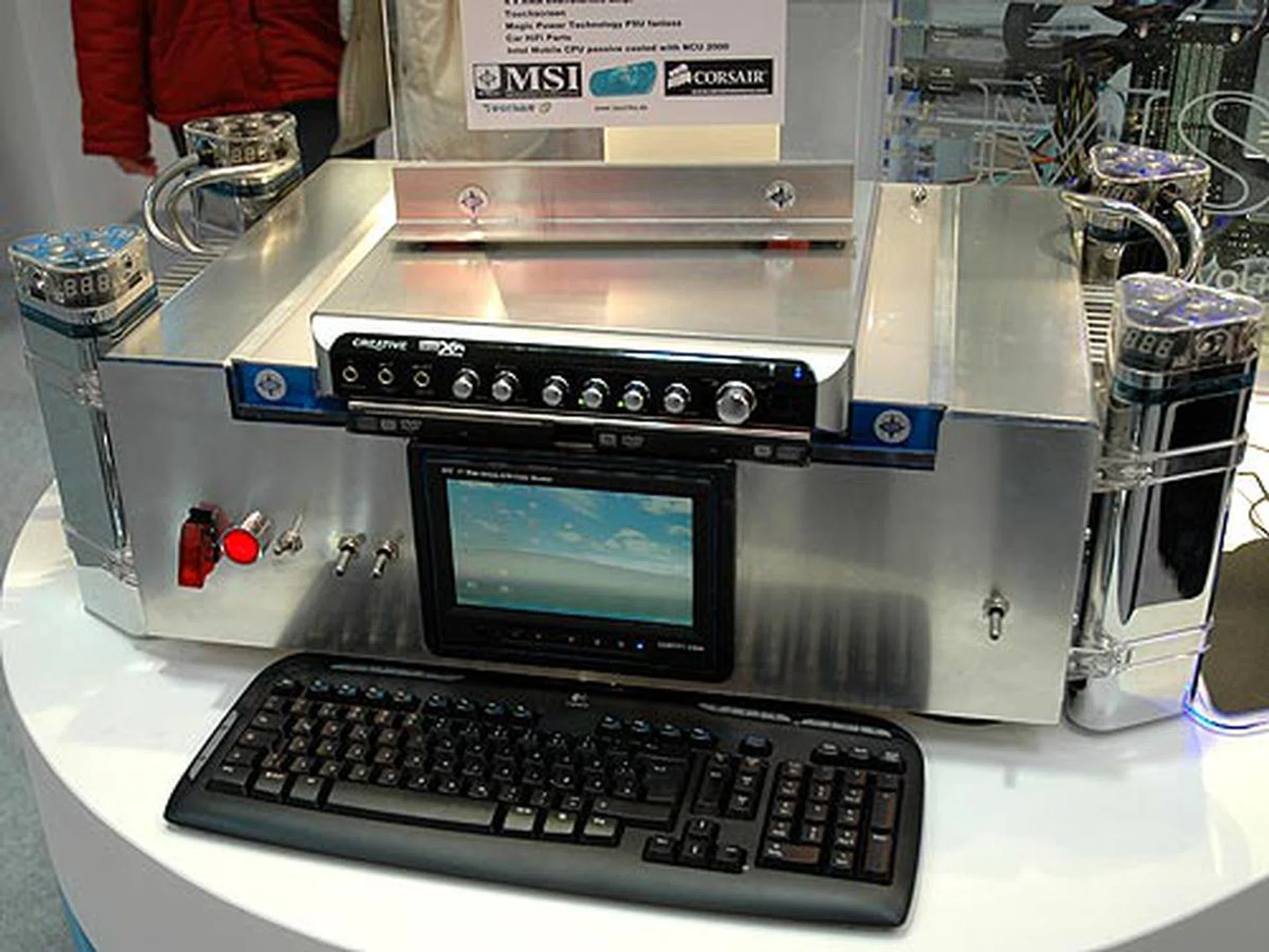 MSI showcased a mean modded machine known as the TAURUS that stands for The Awesome Ultimative Reference Unbelievable Soundmachine. This machine uses an MSI motherboard with car audio parts, a touchscreen as its front panel and a Creative X-Fi Elite Pro sound card.