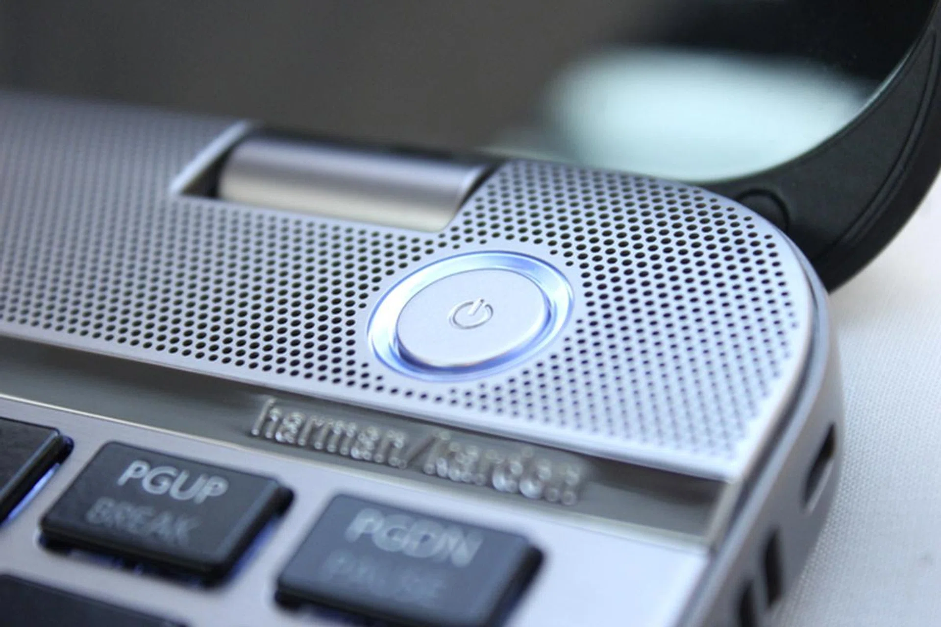 The power button has an LED ring around it, which is a nice design touch.