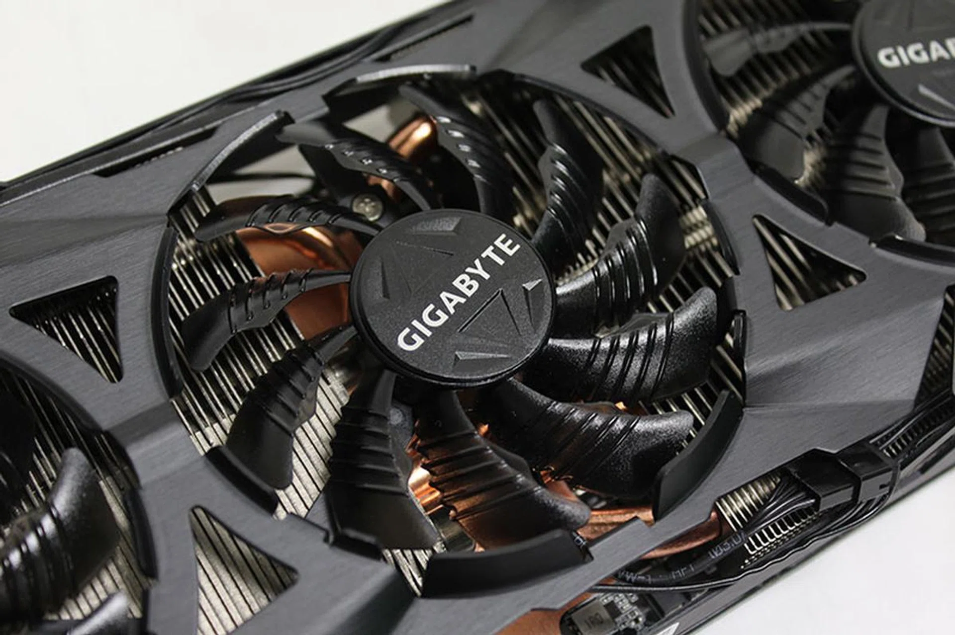 Each of the three fans feature raised ridges and a triangular protrusion to direct air more efficiently to the heatsink.