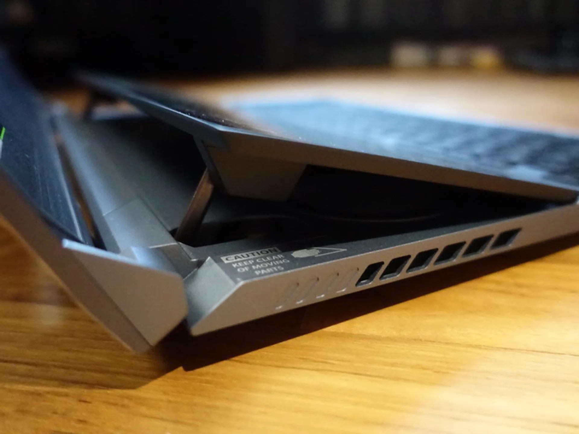 The secondary ROG ScreenPad Plus lifts to create a large air intake path for improved cooling.