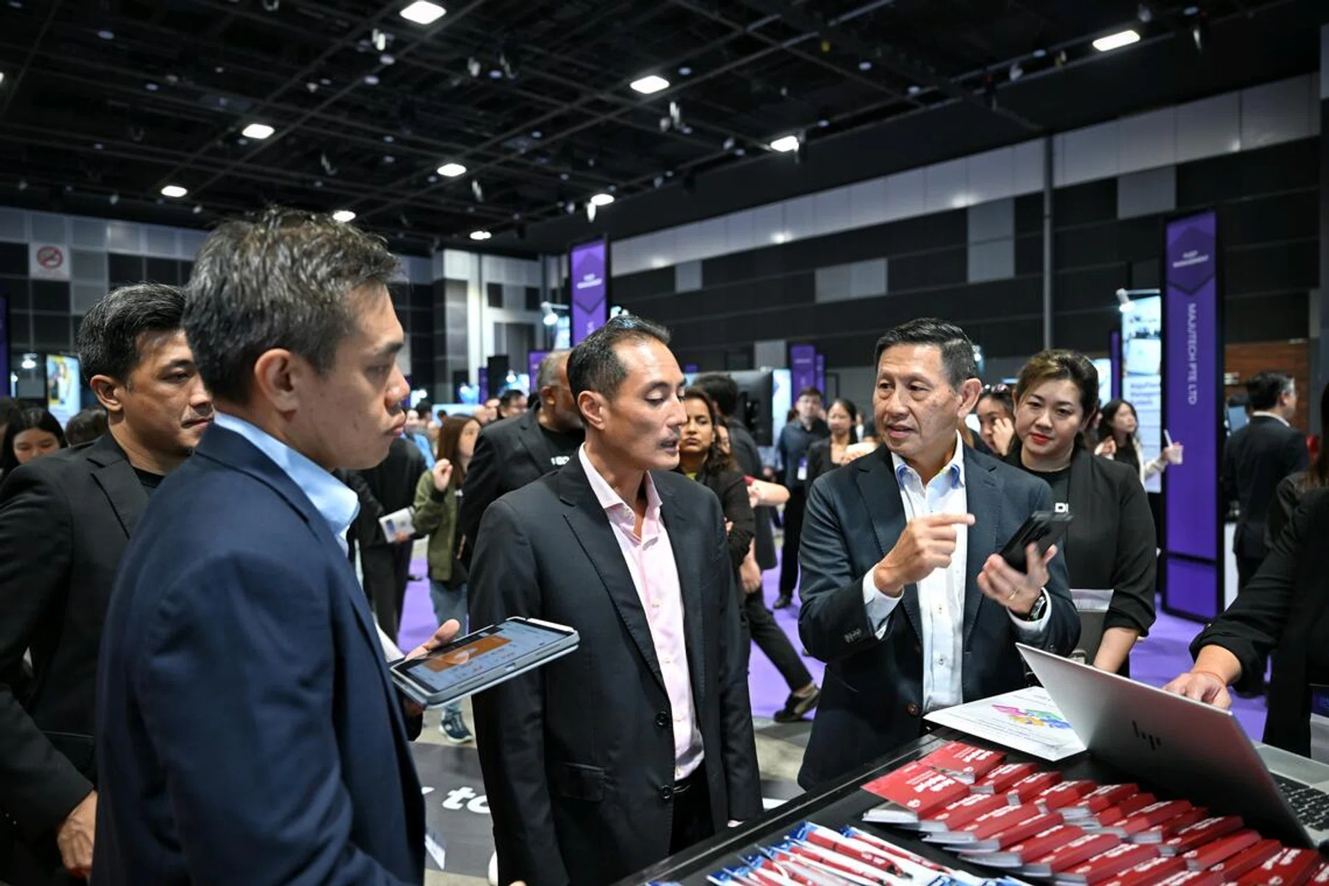 Tan Kiat How, Senior Minister of State, Ministry of Digital Development and Information, at the Singtel booth at the inaugural SMEs Go Digital Day 2025 at Suntec Singapore Convention & Exhibition Centre on Oct 7, 2025.