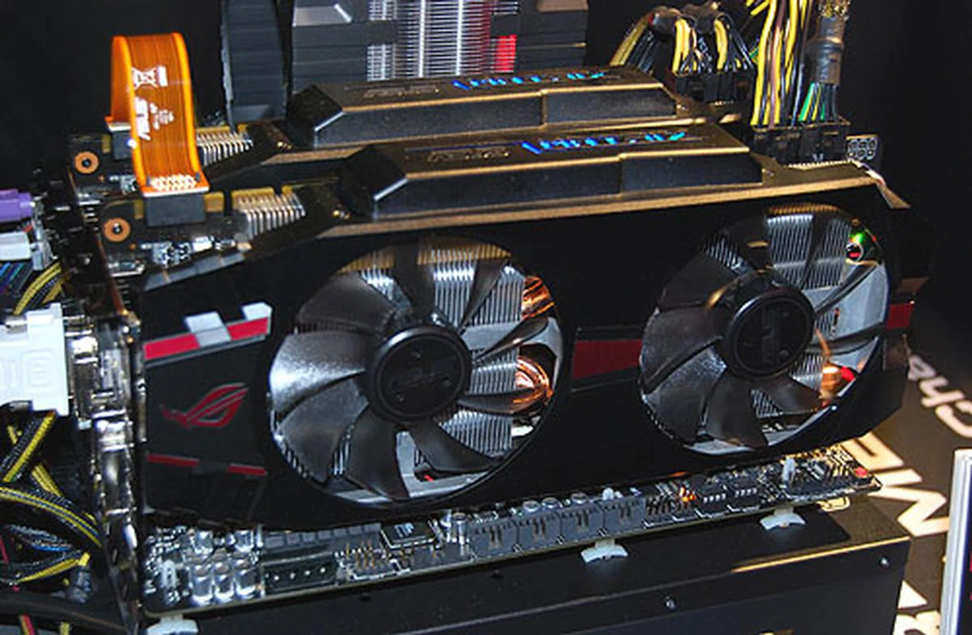 The ROG Matrix GTX 580 graphics card here boasts of greater overclocking headroom, with ASUS offering a number of proprietary utilities to assist in this process. ASUS' DirectCU II cooler is used, which is supposed to lead to 20% cooler operation than the reference card.