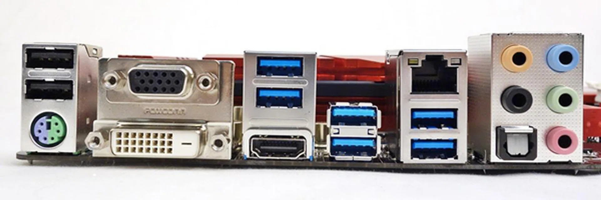 The rear I/O section of the ASRock board, and there isn't a clear CMOS button to be found!