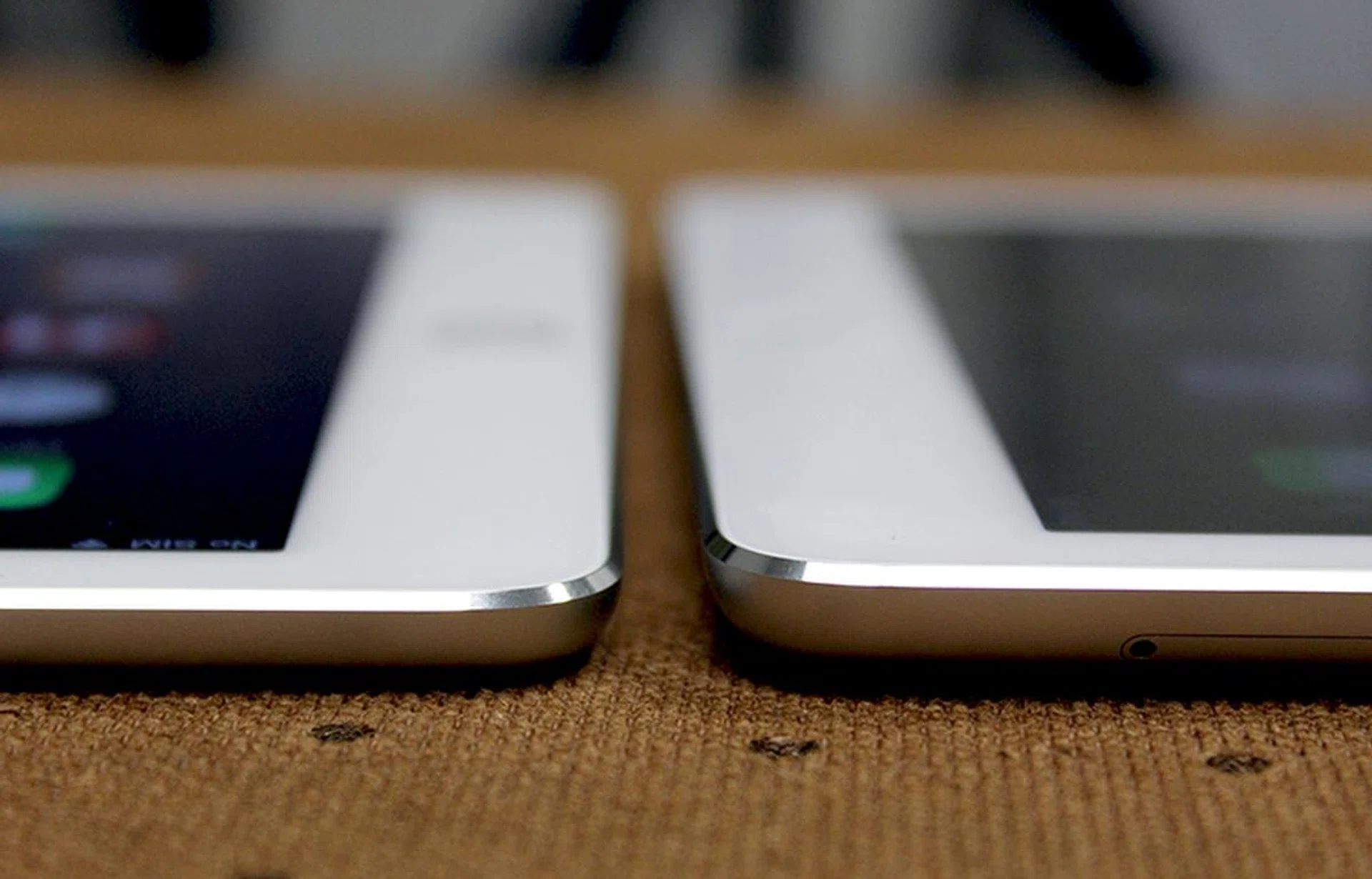 On the left is the iPad Air 2, which is 18% thinner than the iPad Air, which is on the right. Note that the iPad Air 2 still has chamfered edges.