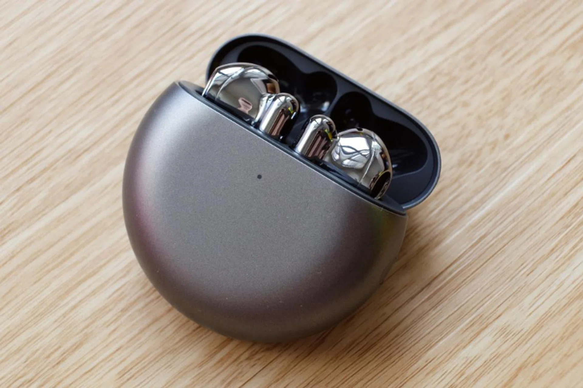 The Huawei FreeBuds 4 in a silver frost finish. 