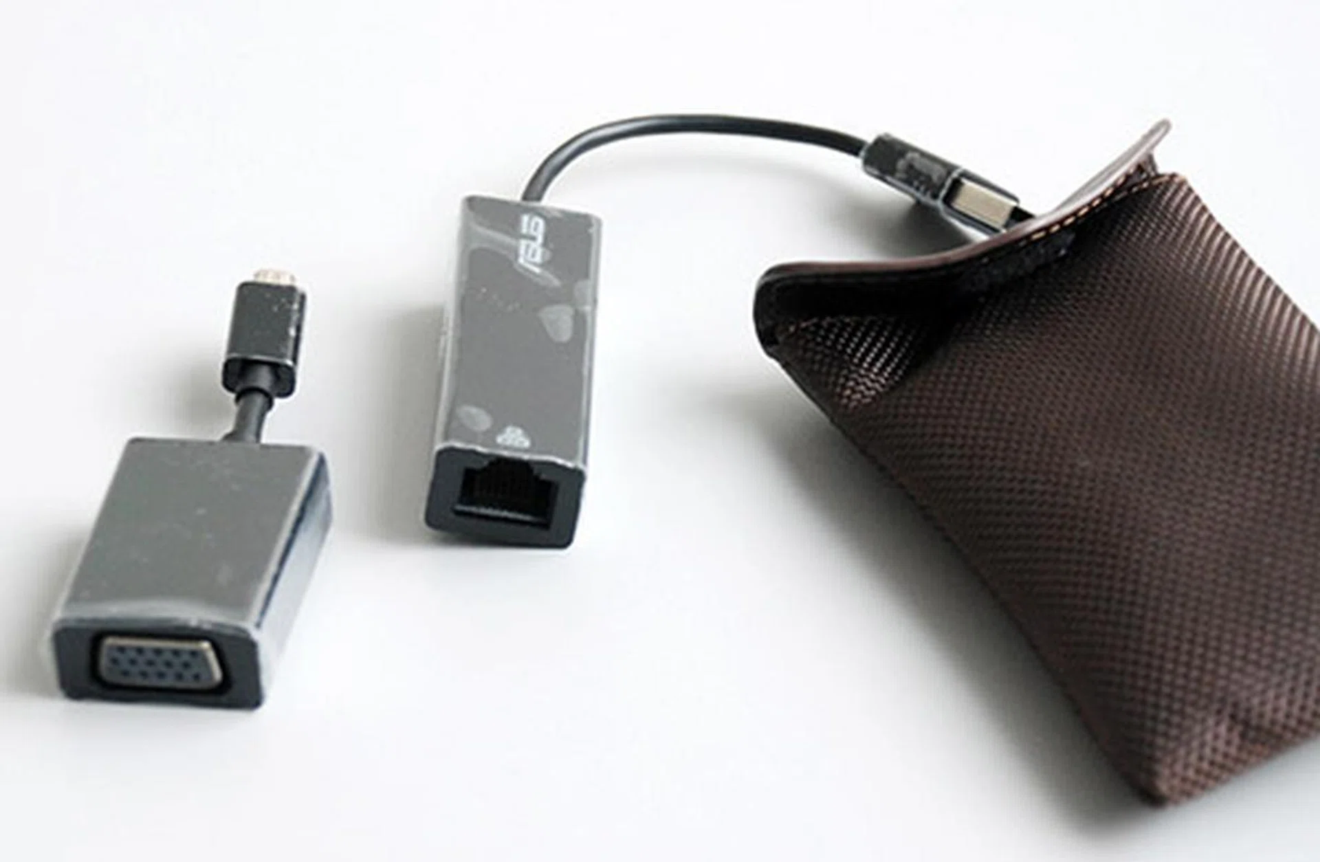 Here are the included converters to provide the Zenbook Prime with a full sized VGA and Ethernet ports. They connect via micro-USB and USB respectively.