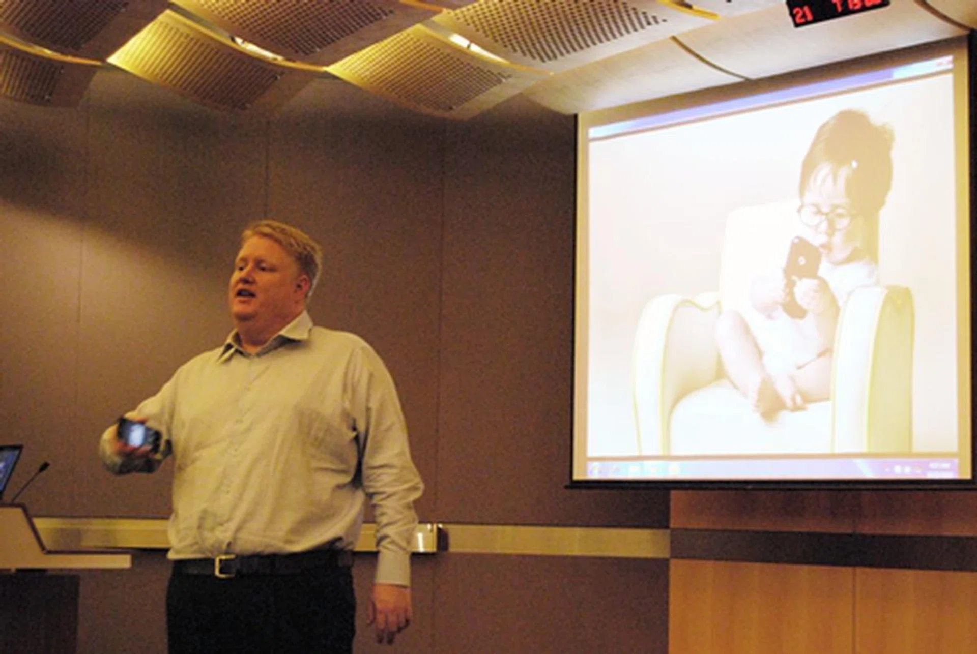 Matthew Hardman, seen here, giving a brief demonstration on Play To, a LG exclusive app found on the LG Optimus 7. The app allows you to easily share and play your multimedia content through an existing Wi-Fi connection with other DLNA DMR compatible devices. 