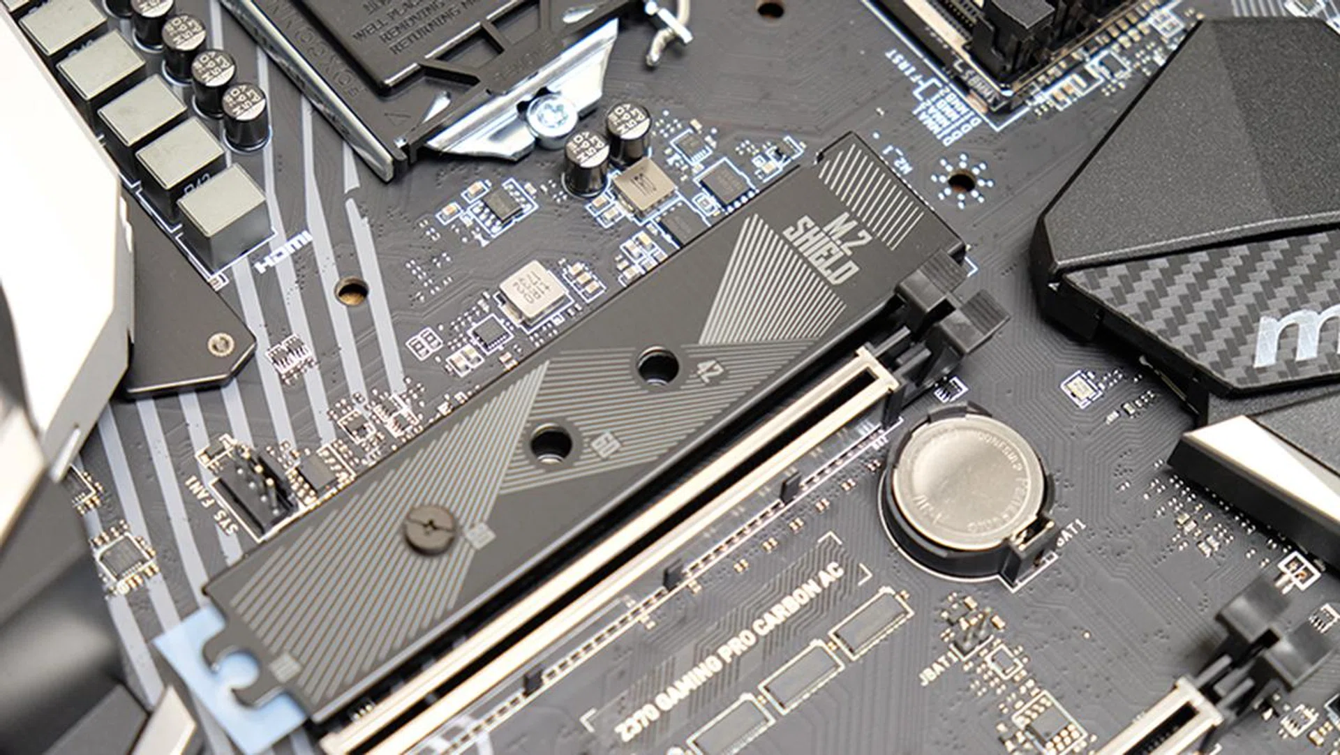 The topmost M.2 socket gets a dedicated heatsink as well.