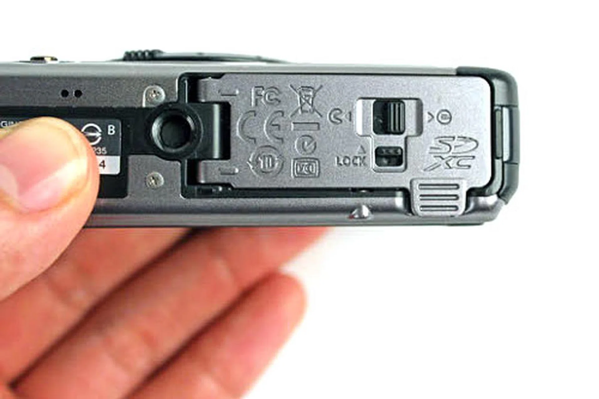The TG-1 is waterproof up to 12m, and to allay your fears, the battery and SD card compartment is sealed with a double lock to prevent accidental opening of the cover.