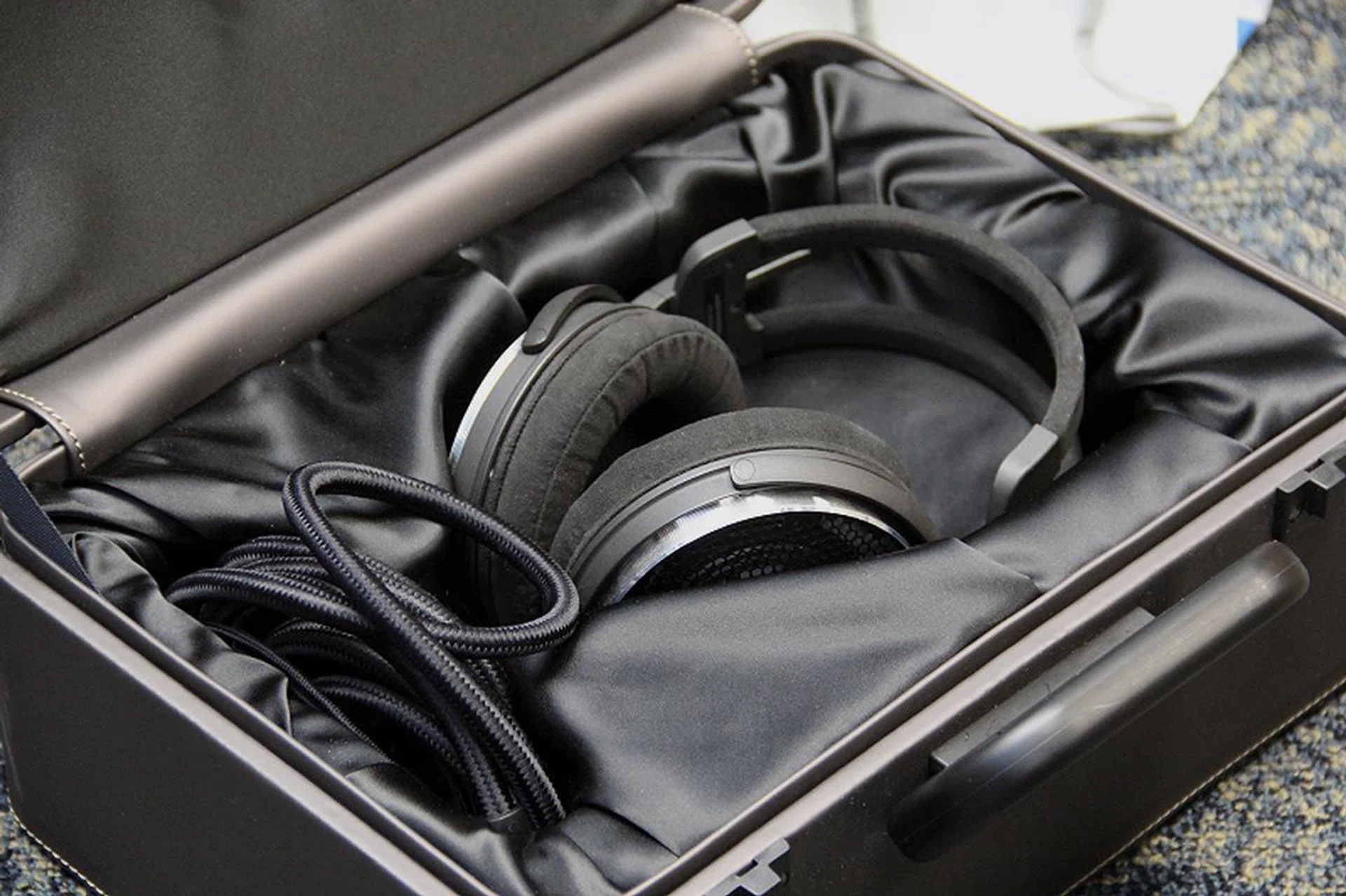 The insides of the carrying case is lined with satin-like cloth.