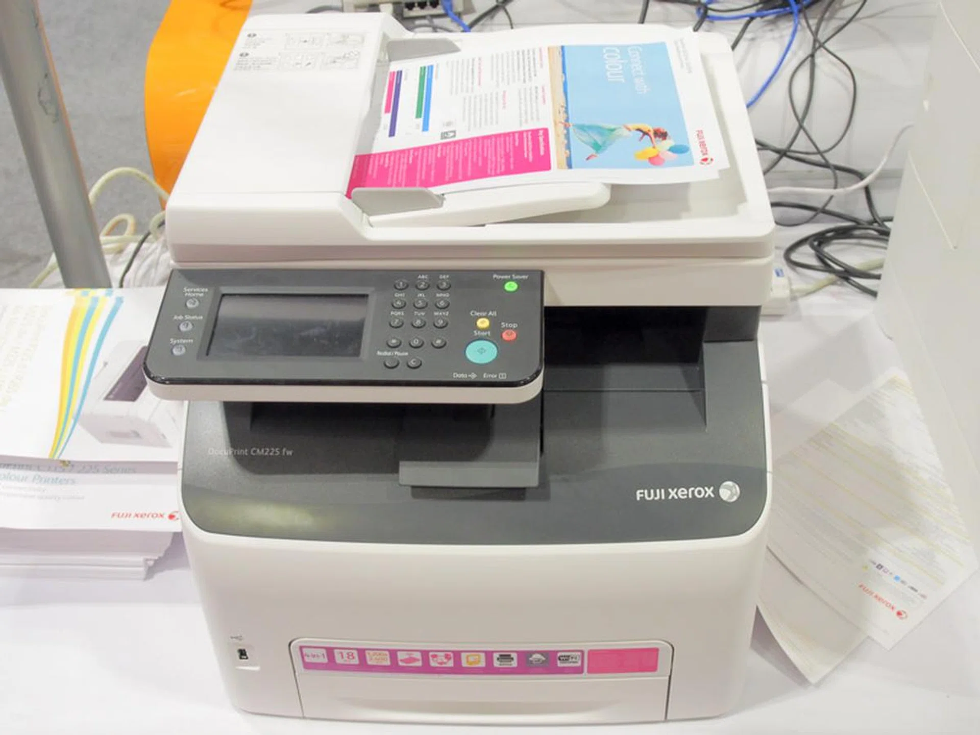 The DocuPrint CM225fw is a A4 color S-LED printer that is network ready, Wi-Fi ready,  AirPrint and Google Cloud print ready. This does print, scan, copy and fax and goes up to 18ppm in both color and mono. It comes with 3 years on-site warranty with drum coverage, and is selling for $549 and you get $80 in NTUC vouchers as well as a free trolley. 