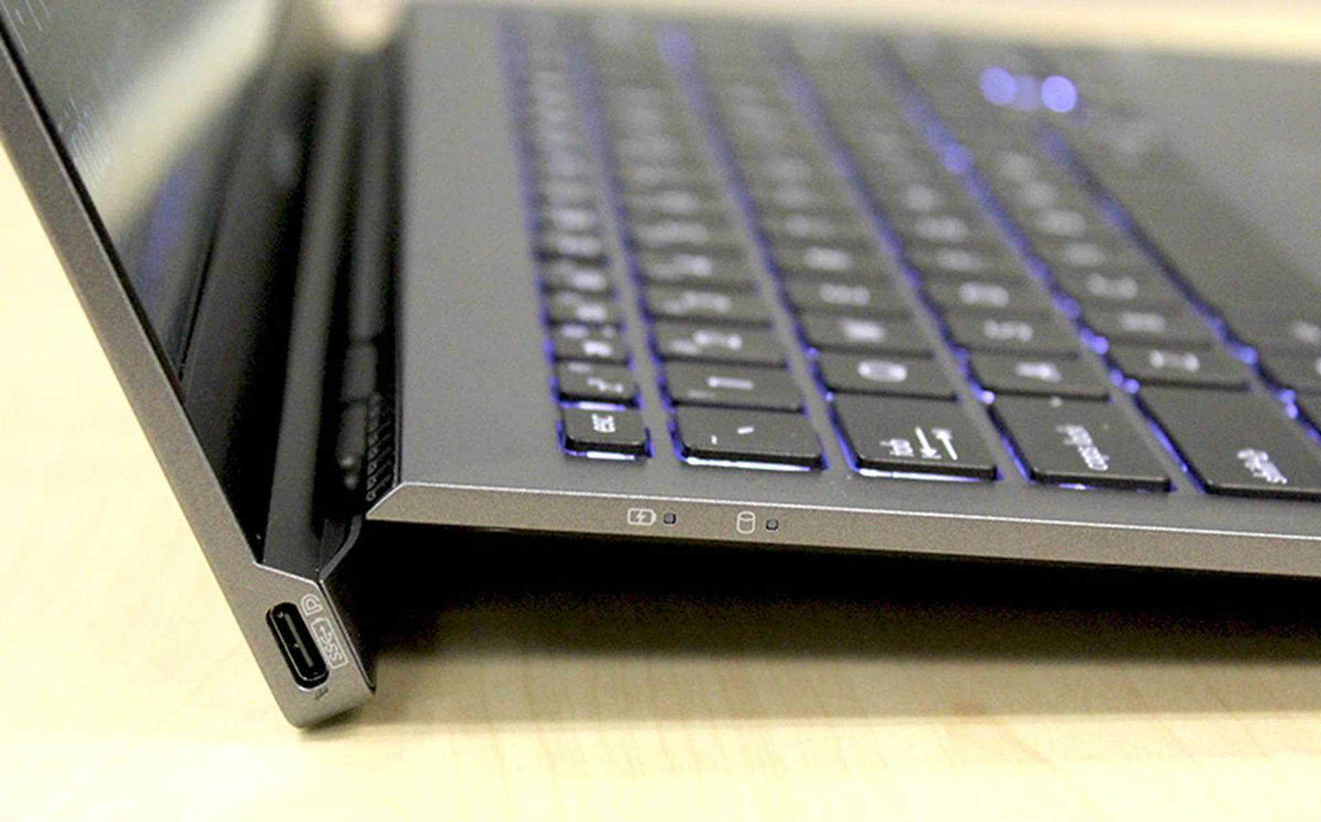 The two USB Type-C ports are integrated at the ends of the hinge. The left one supports power charging, video, and docking.