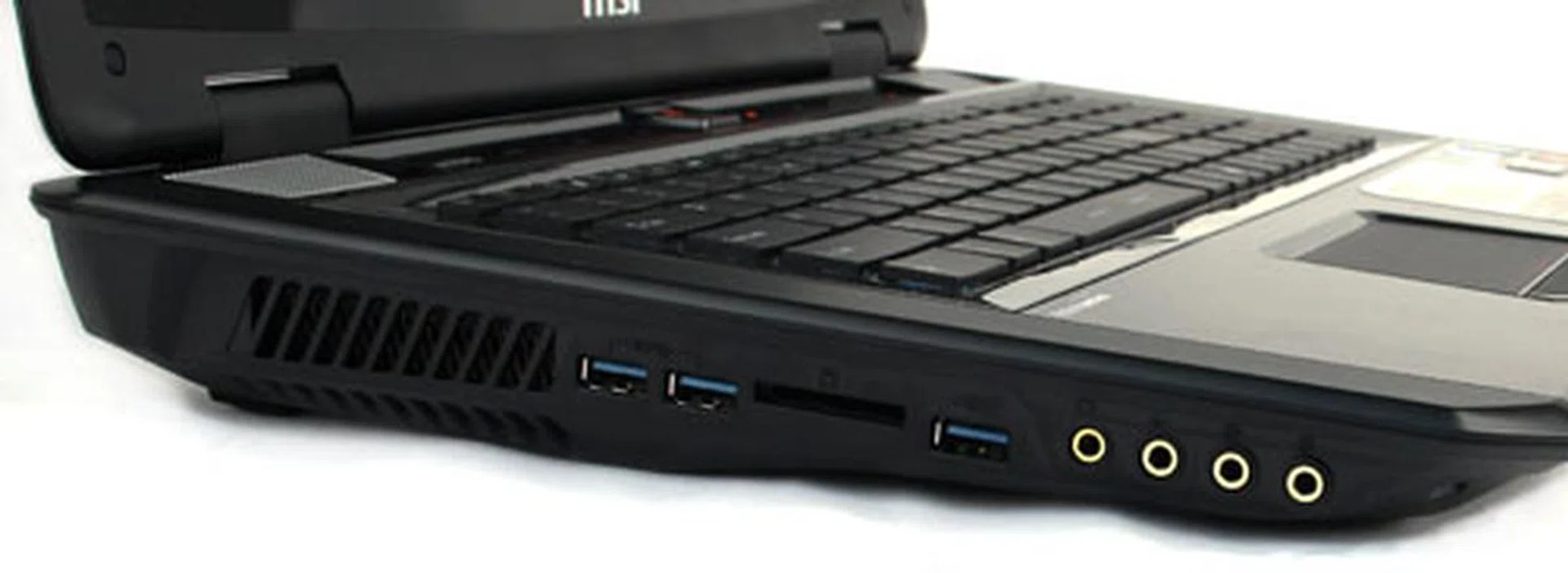 On the left edge, you’ll find three USB 3.0 ports (wow!), a multi-card reader, headphone, microphone, line-in and line-out jacks.
