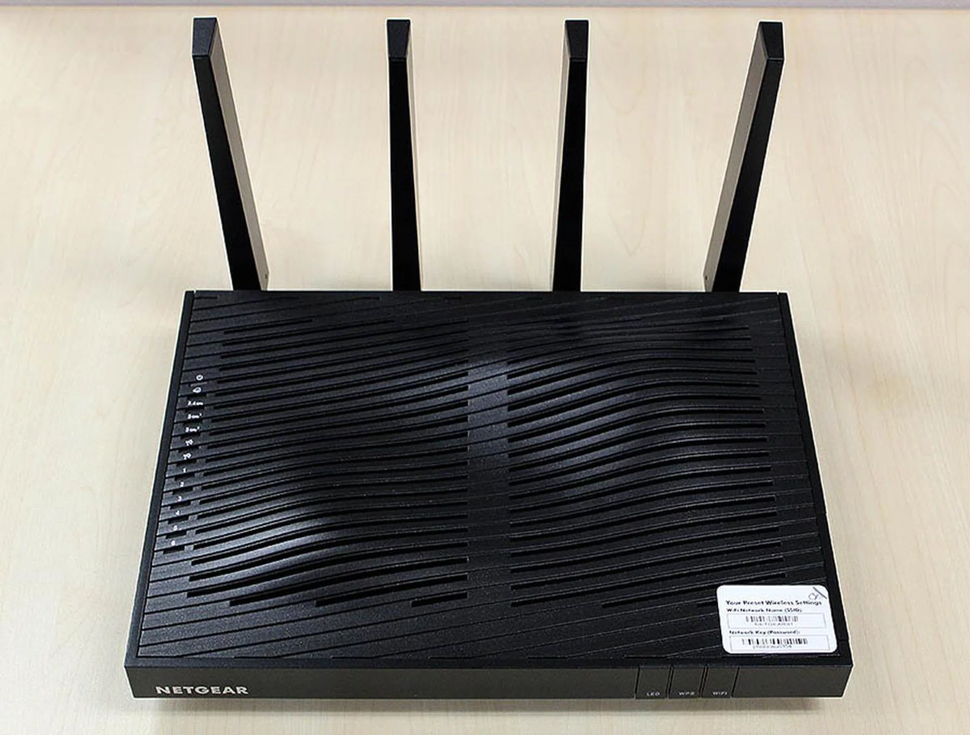 The Netgear Nighthawk X8 is the largest router we have encountered and looks like a Blu-ray player with antennas.