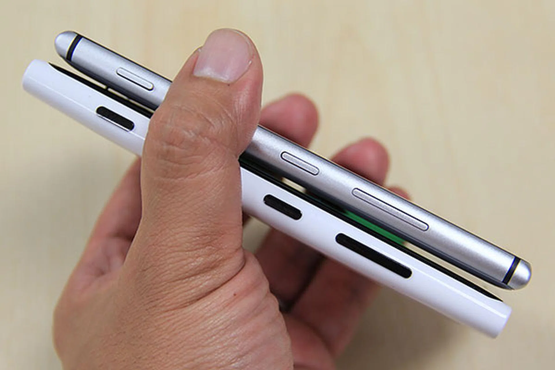 Thinner, lighter, and with a metal frame, the Lumia 925 feels heaps better in our hands than the 920. Similar controls (from left: shutter, power, volume) are found on the right side of the phone.