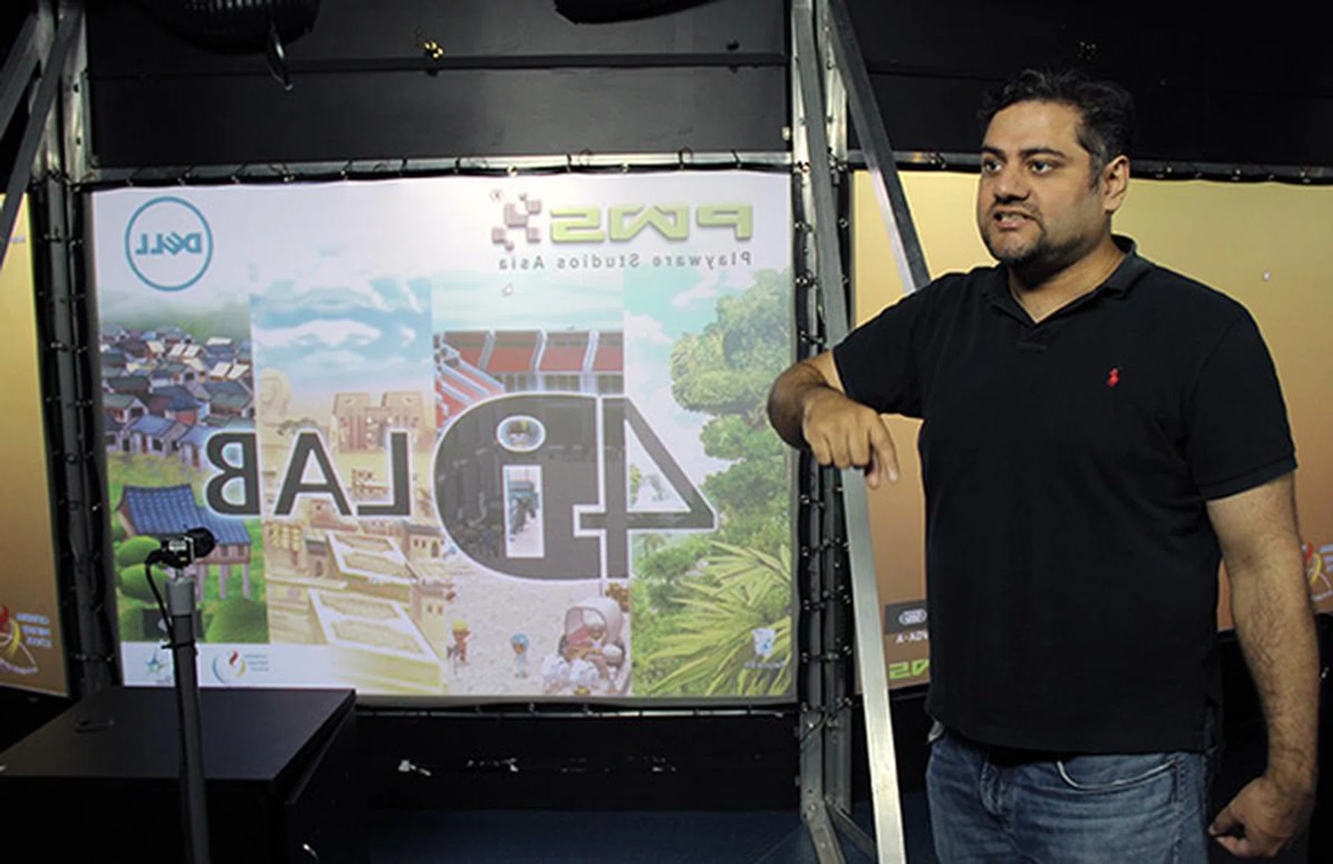 We go behind the scenes to check out the Dell projectors and specially designed touch displays.