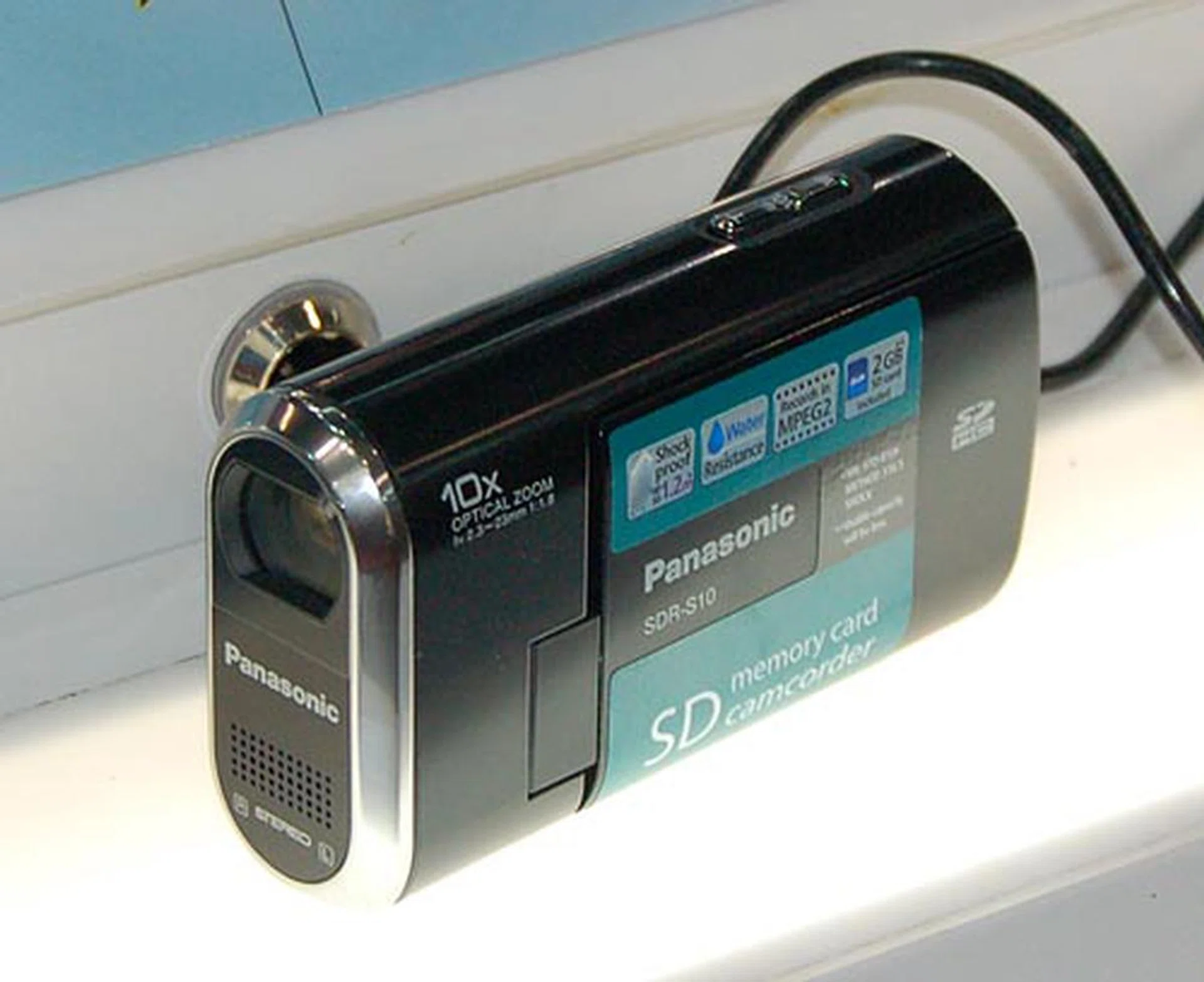  The Panasonic SDR-S10 is an ultra compact digital video camcorder. Despite its size it boasts 10x optical zoom and is water resistant.  