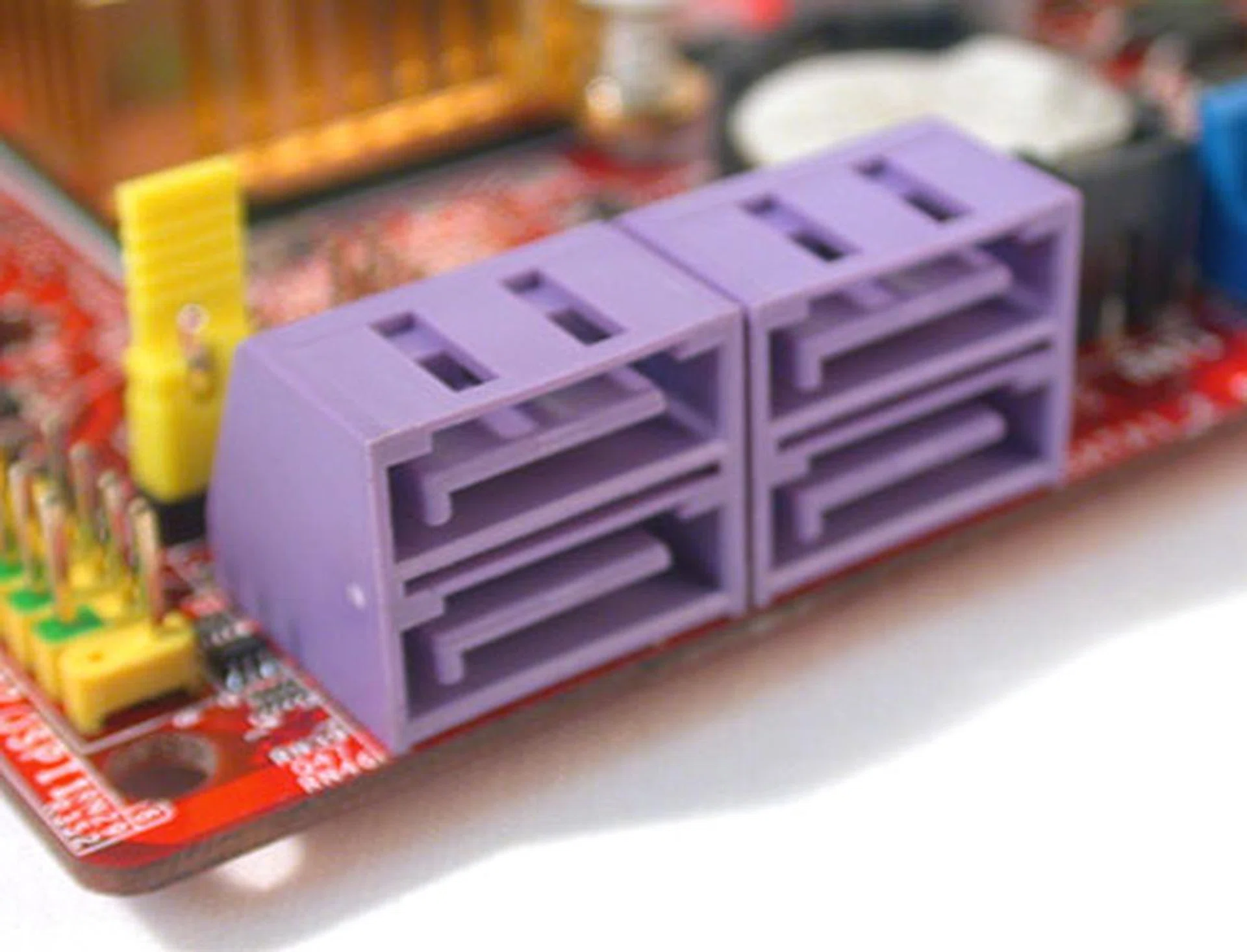 The ICH7 Southbridge only provides four SATA 3.0Gbps ports and there's hardly space on the PCB for MSI to implement additional interface controllers. For the intended audience, it should be just about sufficient.