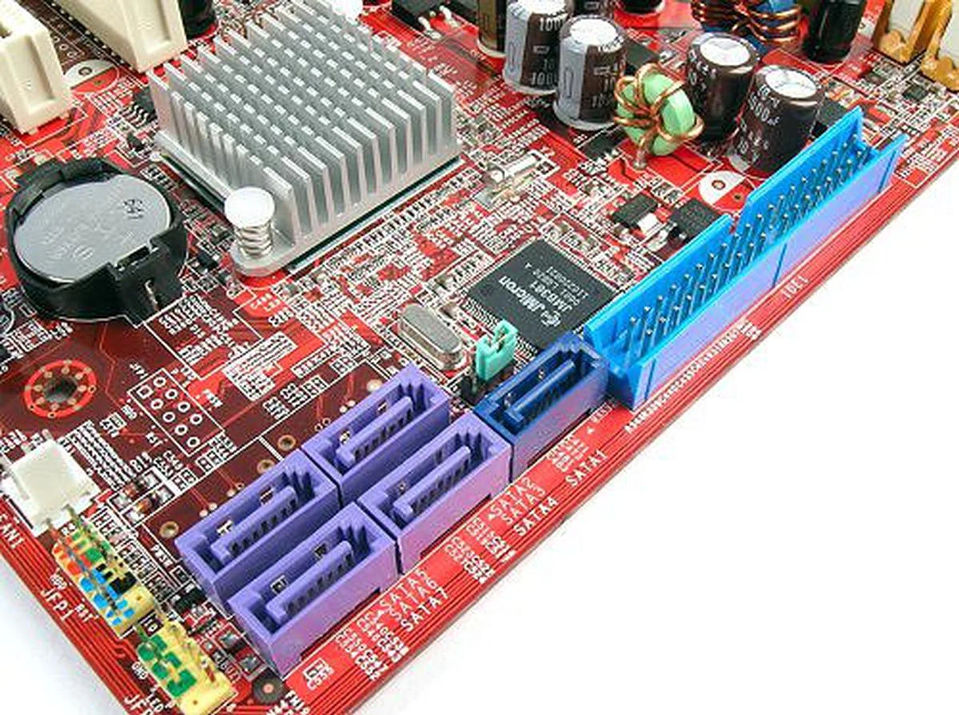 Storage capabilities on the P965 Neo. The four purple SATA ports are the main connections, though they cannot support AHCI or NCQ.