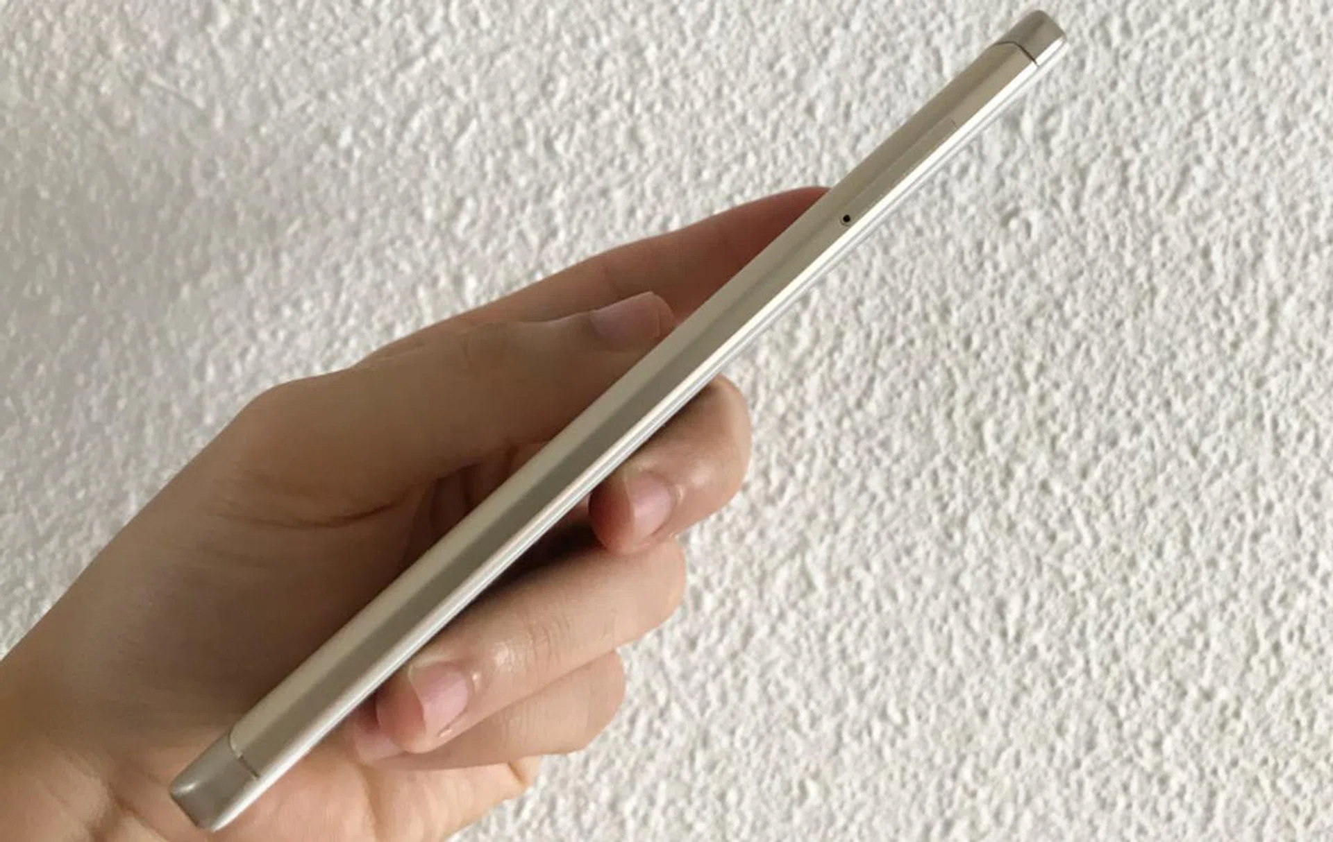 You need a pin to eject the 3-choose-2 hybrid SIM card tray.