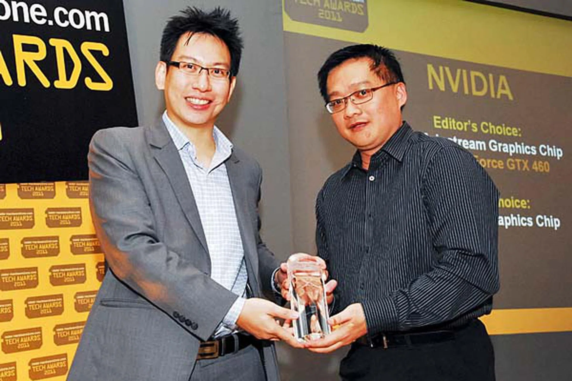 Here's Mr. Edward Lim, Managing Consultant, CIZA Concept, accepting the Reader's Choice for Best Gaming Graphics Chip Brand and Editor's Choice for Best Mainstream Graphics Chip (NVIDIA GeForce GTX 460) awards on behalf of NVIDIA.
