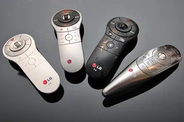 The Wii Remote-like Magic Remote from LG. The longish metallic gray Magic Remote (fourth remote in the picture) is only for the LA8600 series. The standard Magic Remote comes in different colors (white, gray, or black depending on the TV's cabinet/stand color) are for the other series.