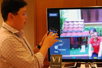Panasonic spokesman, Will Yu, demonstrating the finer aspects of the improved Viera Remote app which transforms your smartphone or tablet into a touch-based remote with tap-and-flick features.  