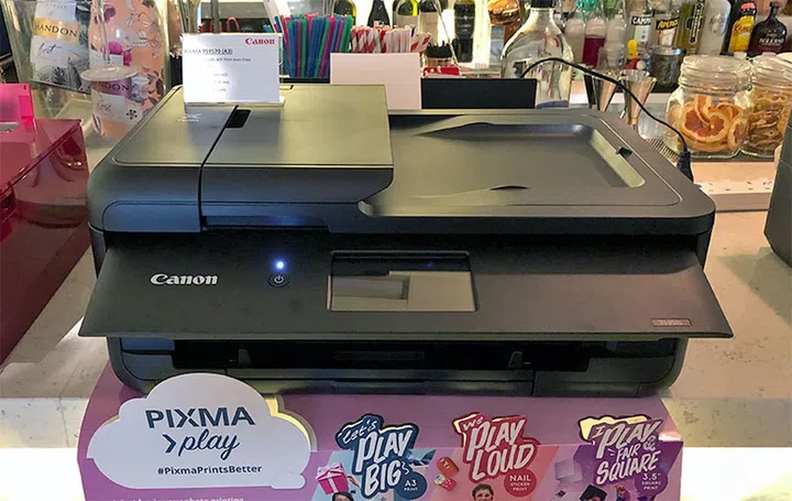 The Canon Pixma TS9570 is a 3-in-1 photo inkjet printer with a 20-sheet ADF.