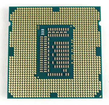 The Intel i7-3770K and its 1,155 contact pads. This processor is considered a 'tick' in Intel's recurrent pattern of CPU launches and expectations of its performance are not set high due to this fact. Will the flagship processor of the Ivy Bridge series march according to the expected cadence of Intel product strategy or will it spring a surprise? This question will be answered in our following review.