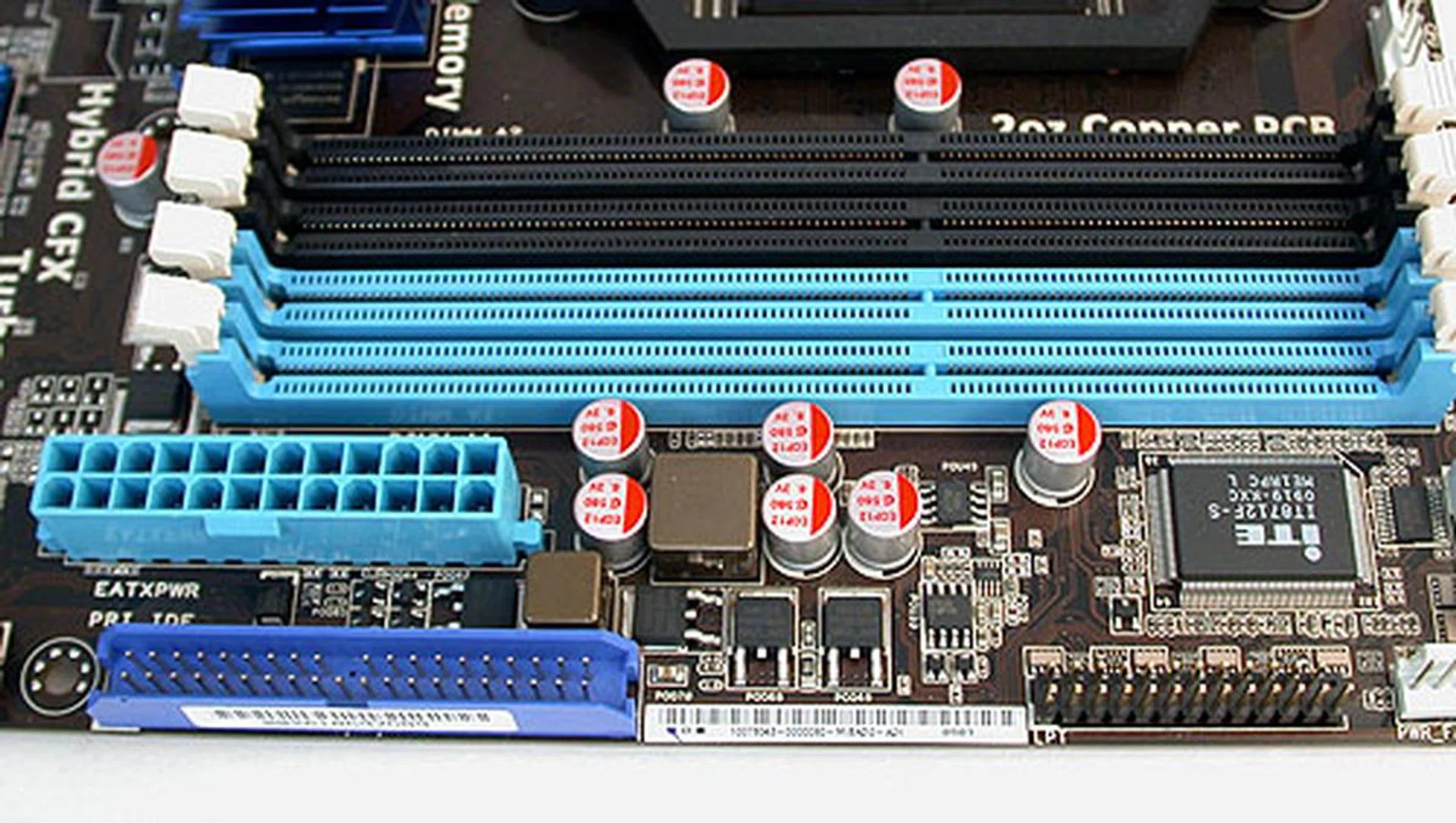 There's an IDE connector below the ATX power connector and the four DDR3 DIMM slots. And if you're still sticking with your old floppy drive, you won't be able to use it here.