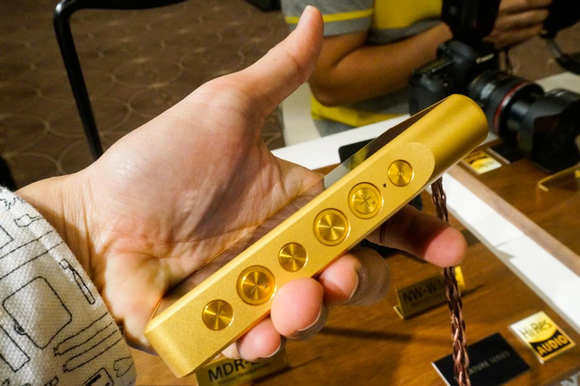 Other than the touch screen, a row of buttons down the side of the player allow you to control playback.