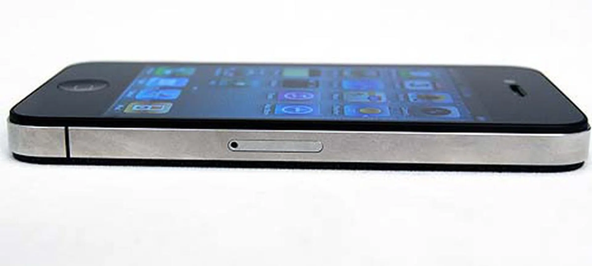 If you're looking for the SIM card slot, it's now at the right hand side and has been changed to a Micro-SIM slot.