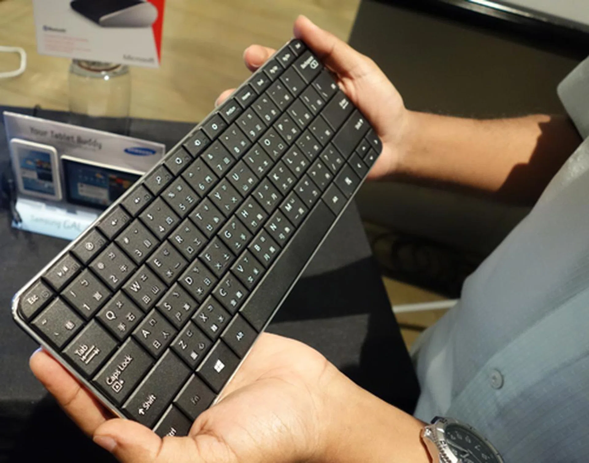 The Wedge Mobile Keyboard features a full-sized keyset but remains relatively small. This is the Chinese version, the Singapore version will not include the chinese characters. It will be available at the end of August for $99.