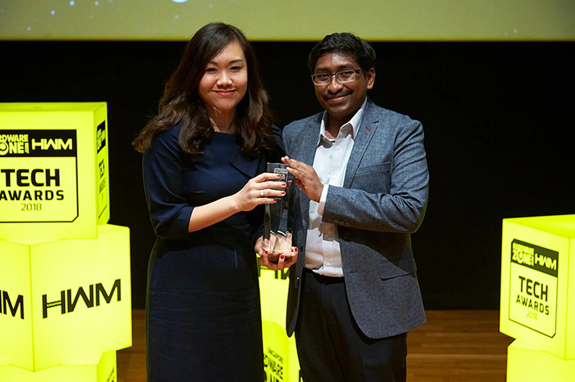 Challenger is once again voted by our readers as their favorite local consumer electronics chain store. Receiving the award here is Ms. Loo Pei Fen, Chief Marketing Officer, Challenger Technologies.