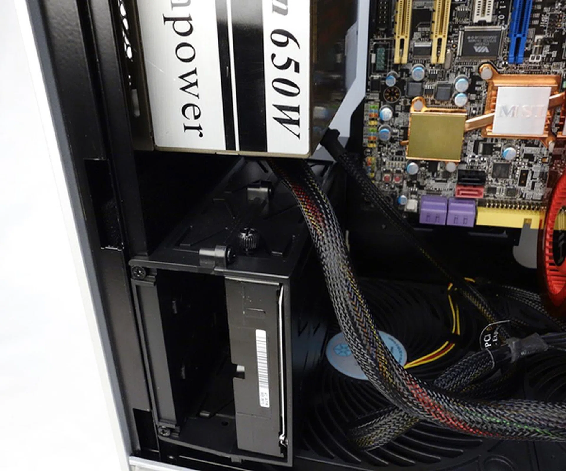 Our 3.5-inch HDD slid into its slot and it's held in place with a pair of thumbscrews.