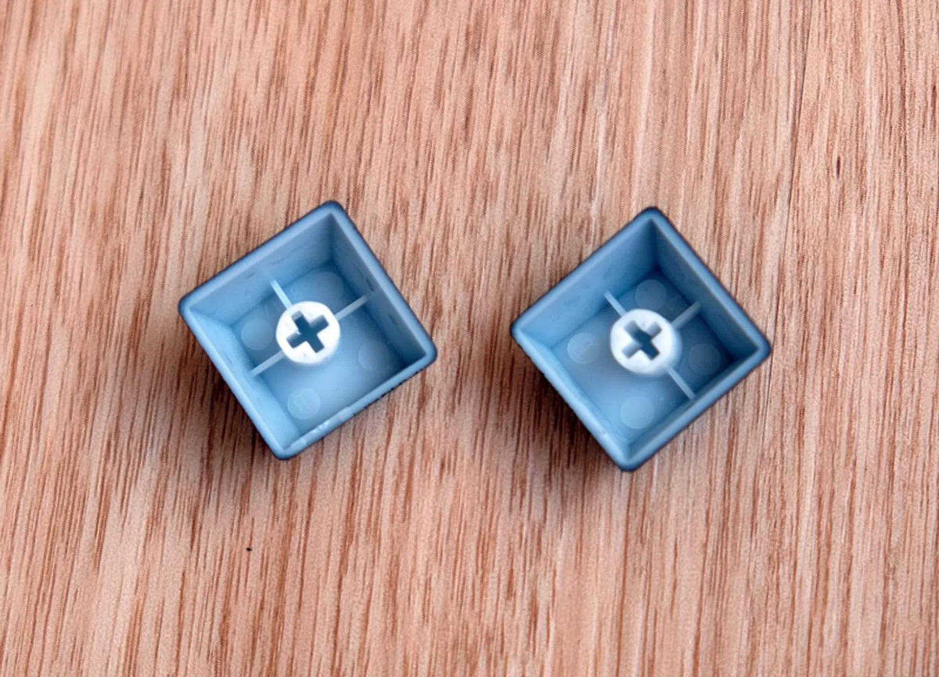 The keycaps are doubleshot ABS and are quite stiff.