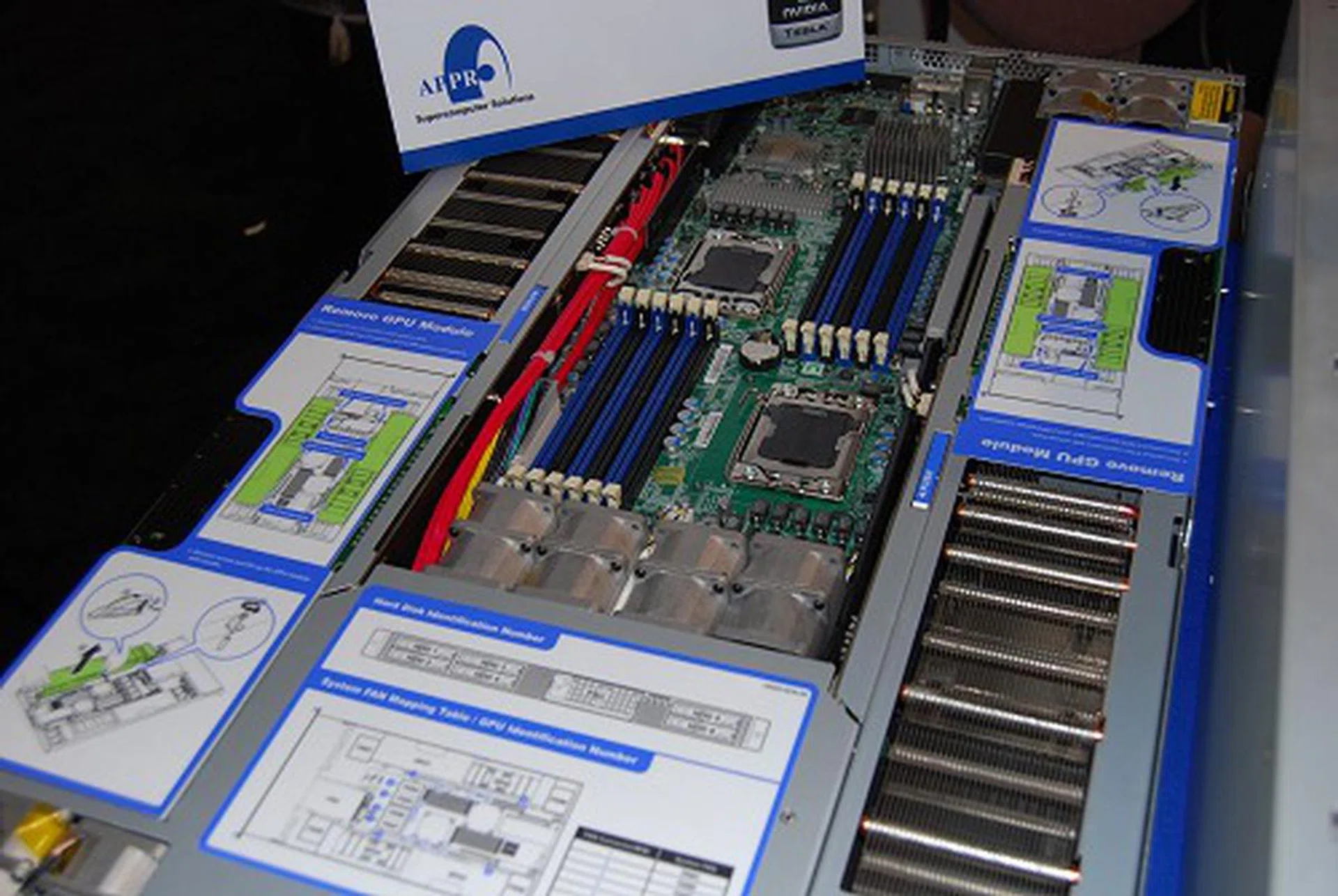 Here's another rack unit, Appro's 1U Tetra GPU Solution. Each rack can house dual Intel Xeon processors and quad Tesla M2050 GPUs. The interesting aspect of this rack is its modular integration of the Tesla GPUs which are neatly installed on both the sides of the rack. This is an example how server racks these days are thoughtfully designing racks to cater to GPU processing as well.