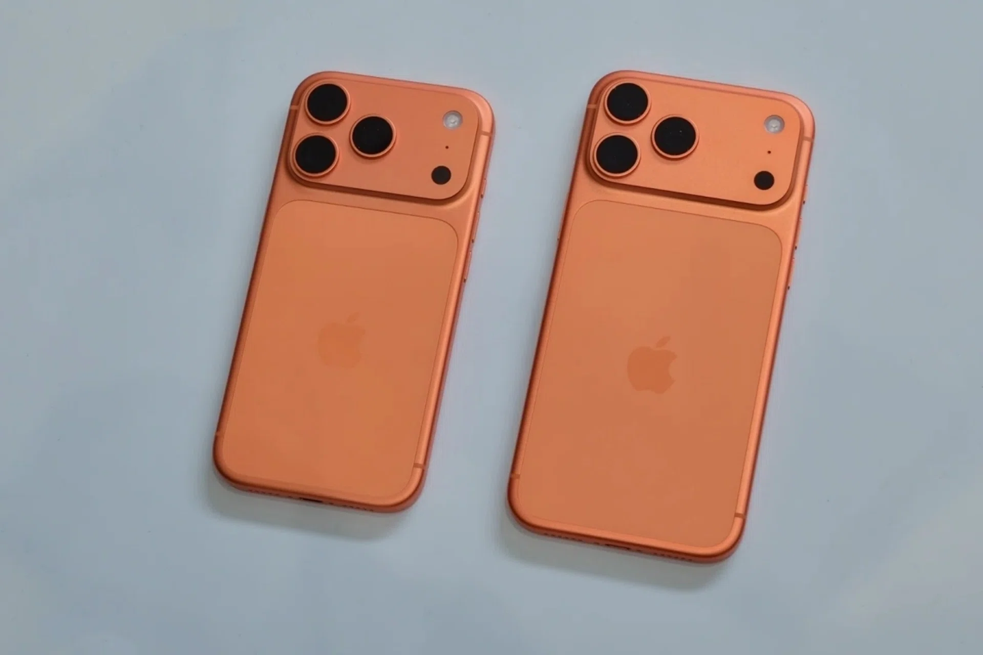 The Apple iPhone 17 Pro and iPhone 17 Pro Max in Cosmic Orange.
