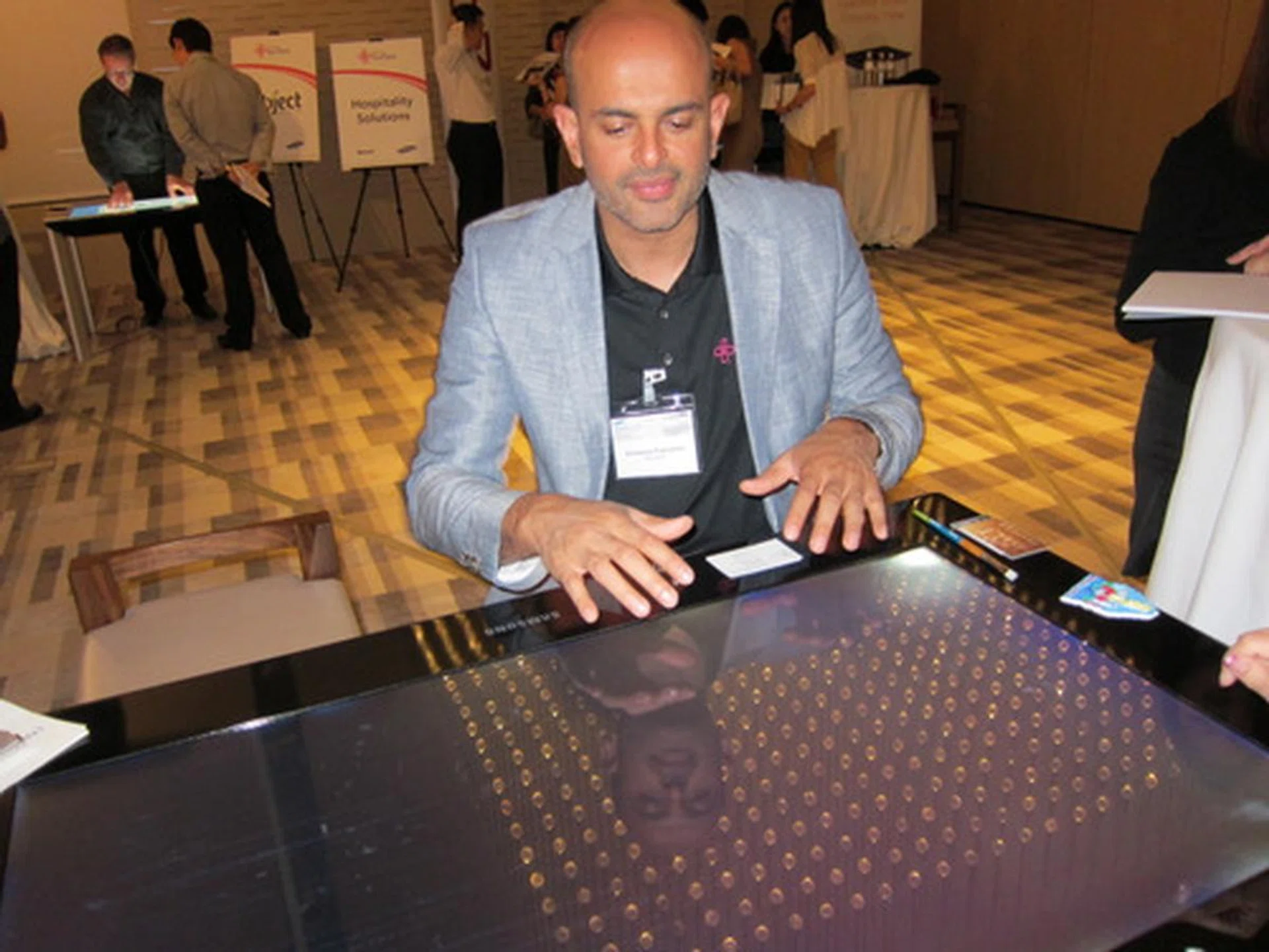 Somanna Palacanda, Director of Microsoft Surface Marketing, gave us a quick demo of how the SUR40 works.