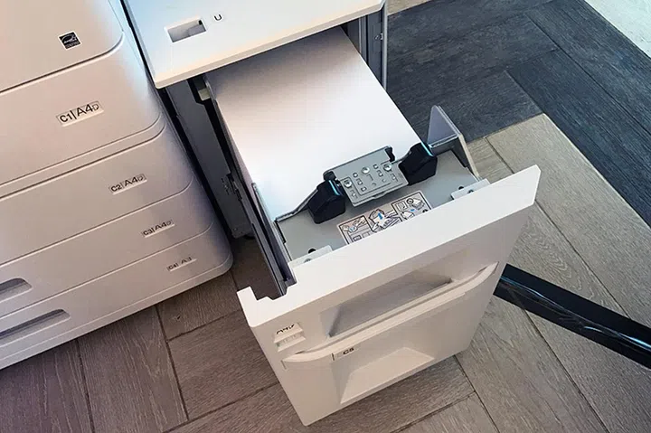 The optional 3,000-sheet paper "tray" that looks more like a small cabinet.
