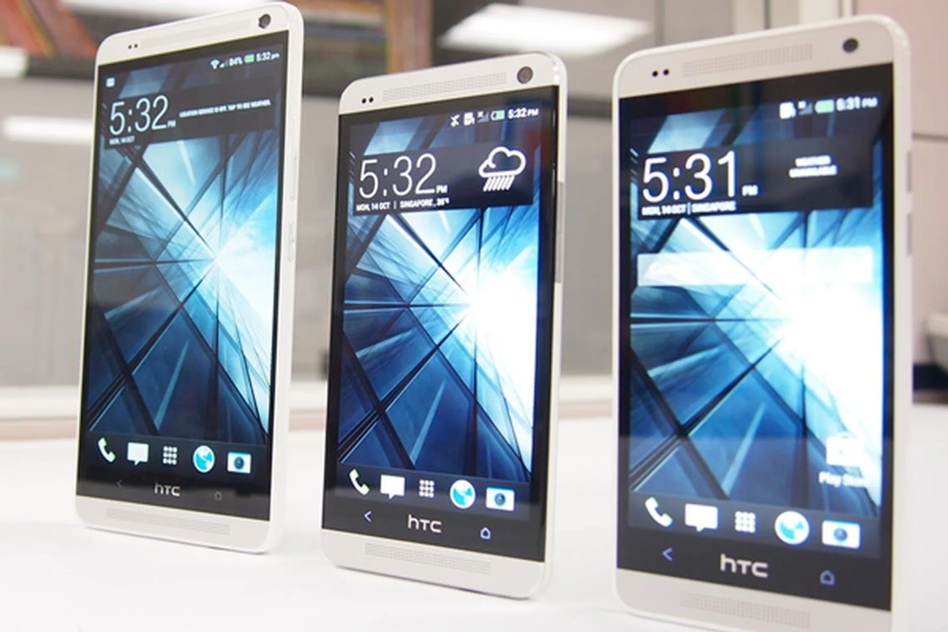 The three musketeers of the HTC One family. <br> Left to right: HTC One Max, One, One Mini.